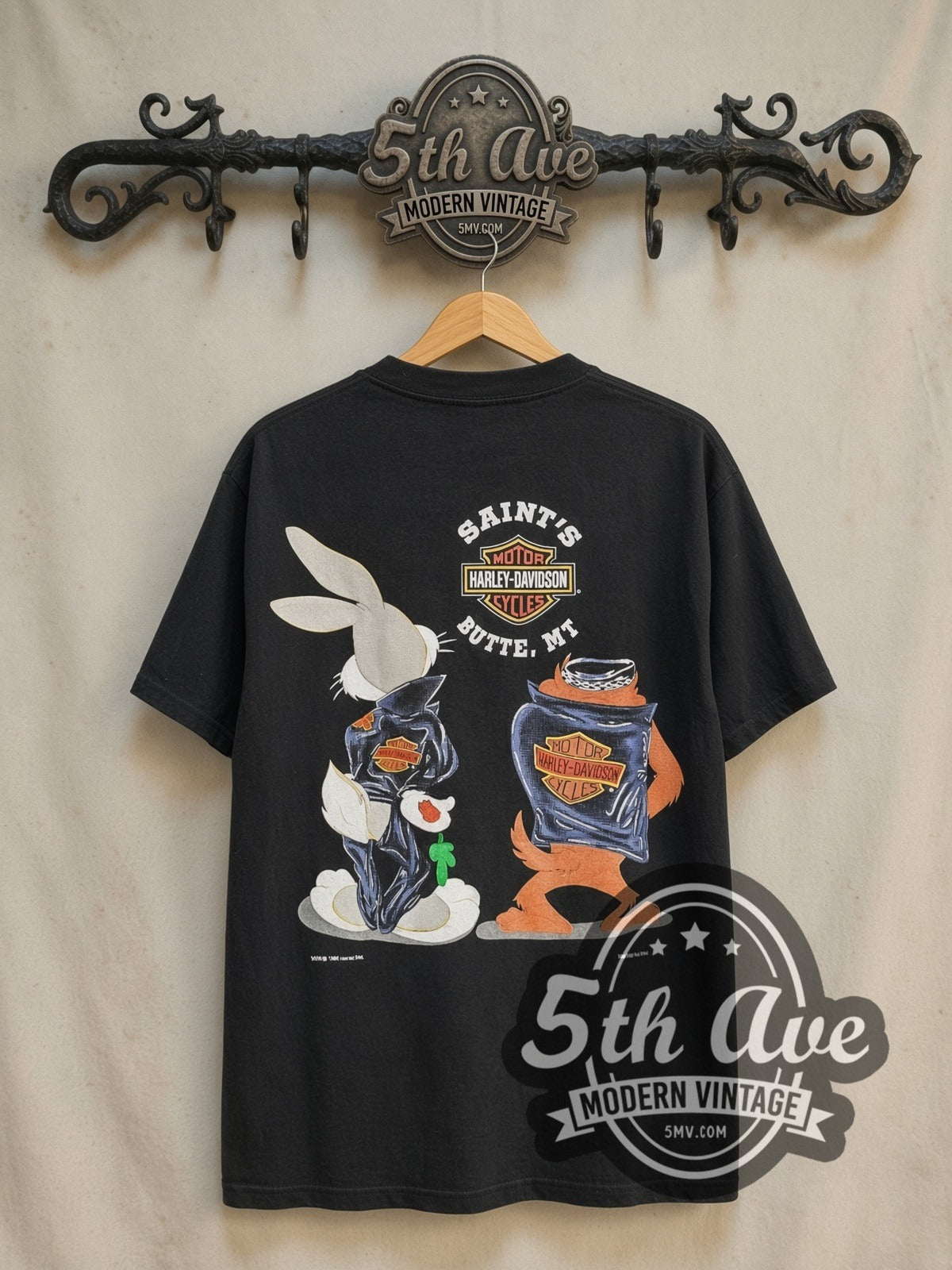 Harley-Davidson Bugs Bunny & Taz Saints Butte MT vintage Harley tee in black, back view on a display rack