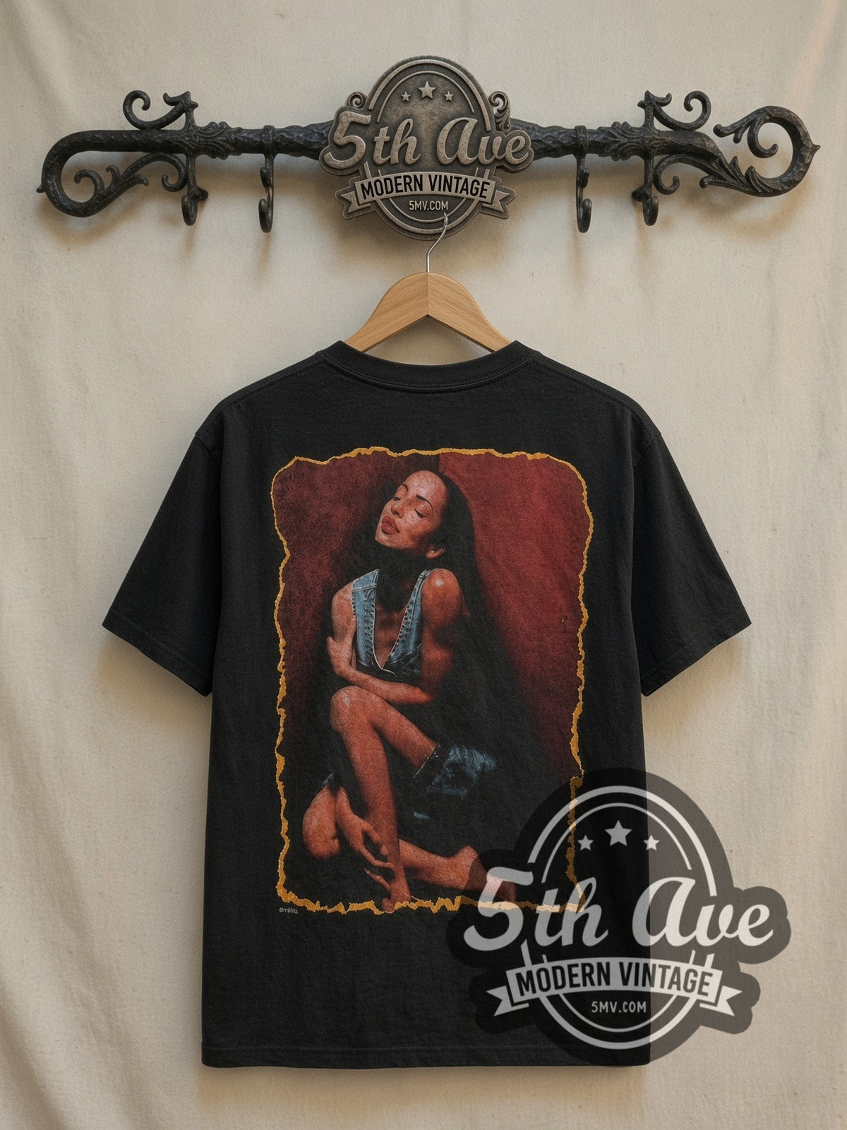 Sade Promise vintage band t-shirt in black, back view on a display rack