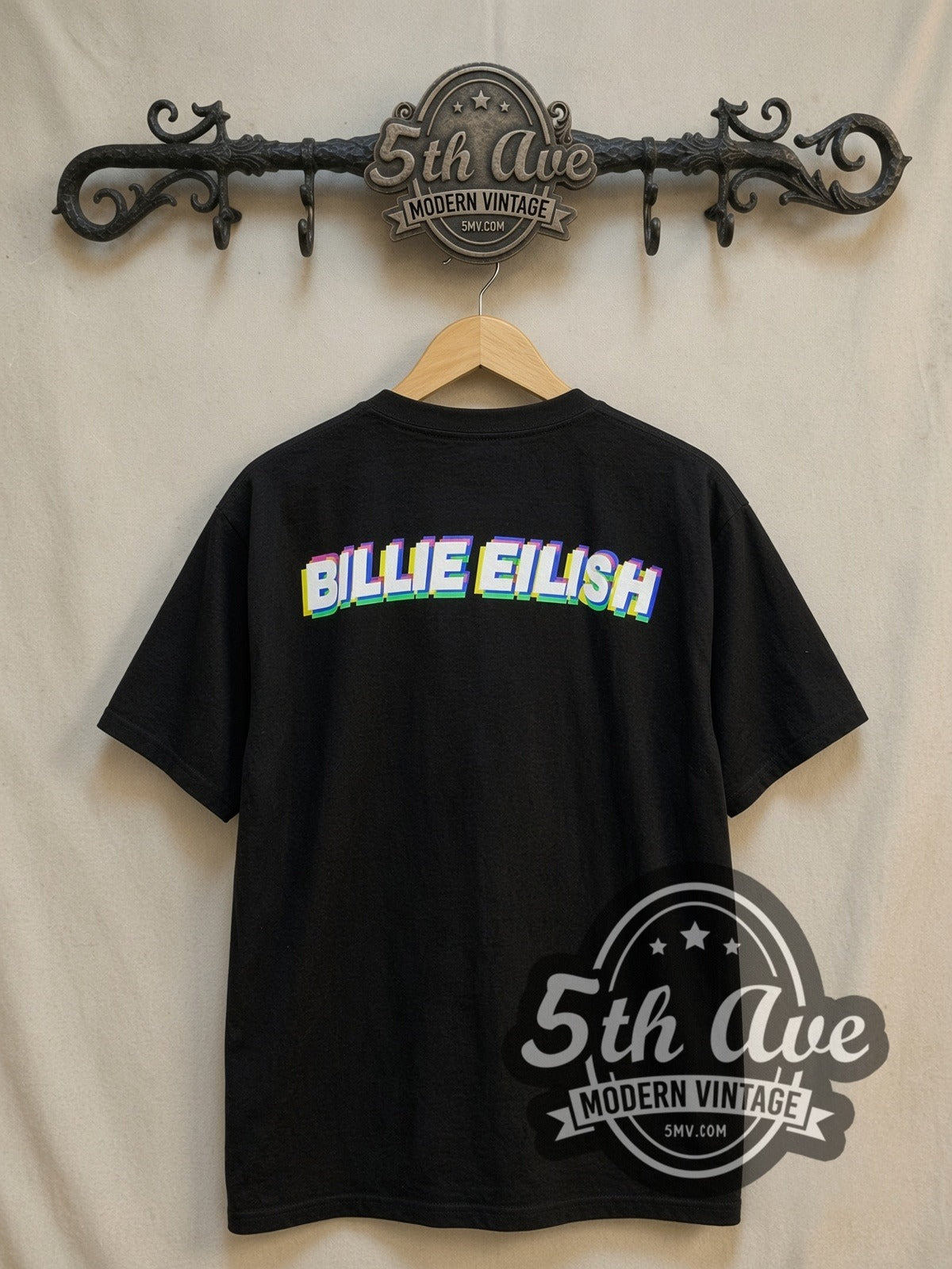 Billie Eilish vintage band t-shirt, back view on a display rack