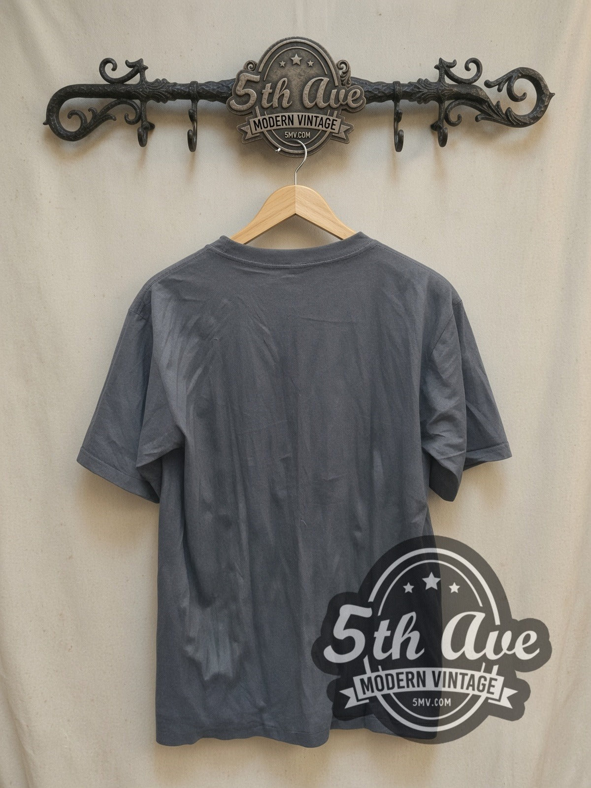 Nirvana In Utero Anatomical Angel vintage band t-shirt, back view on a display rack