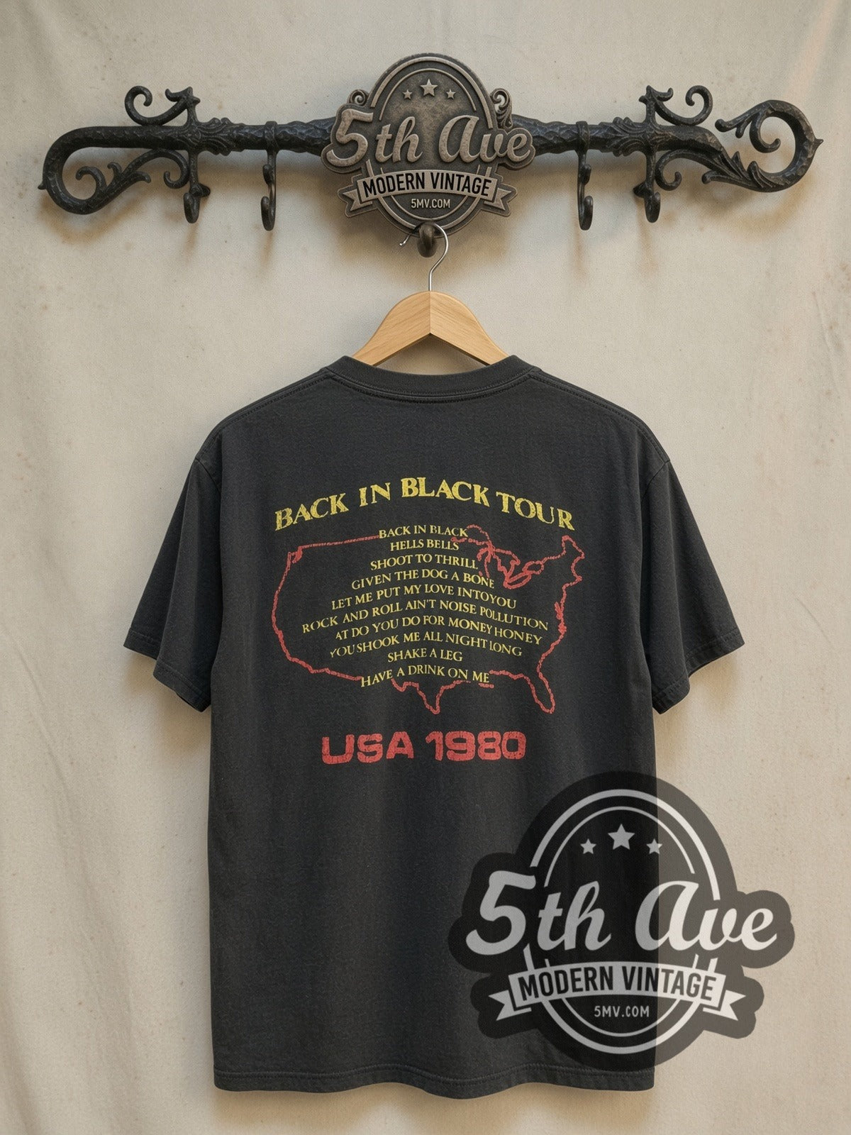 AC/DC Back in Black Tour 1980 vintage band t-shirt in black, back view on a display rack