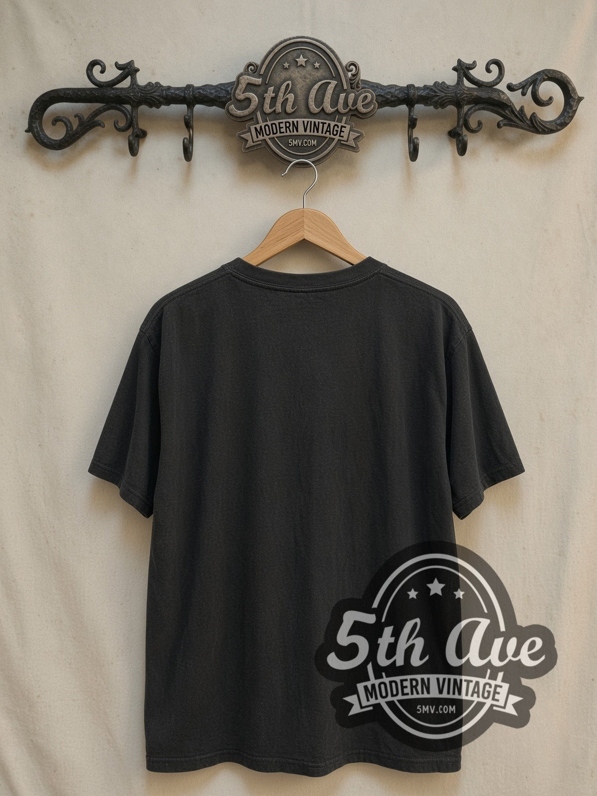 Oasis Band Image vintage band t-shirt, back view on a display rack