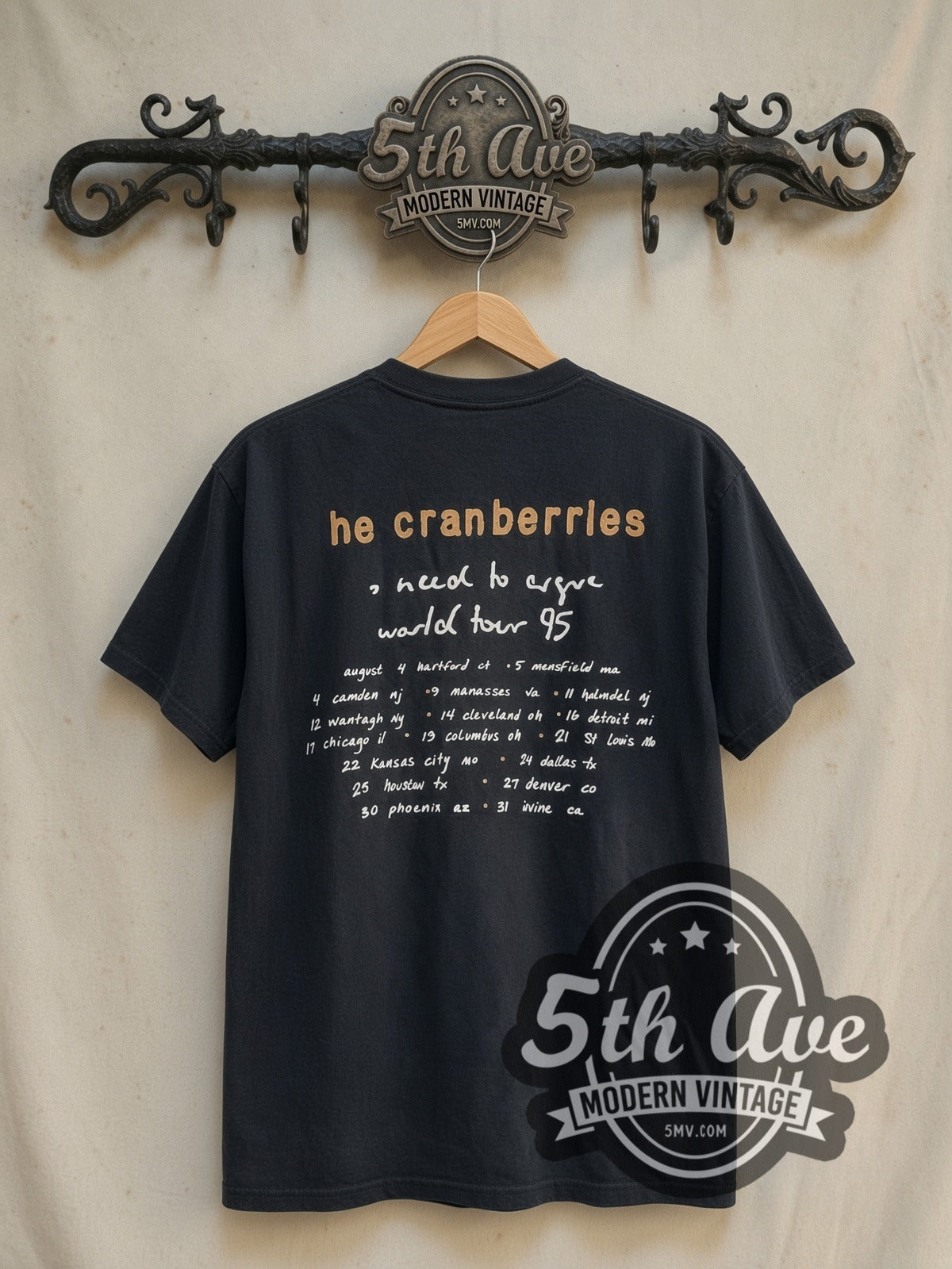 The Cranberries No Need to Argue World Tour 1995 vintage band t-shirt in black, back view on a display rack