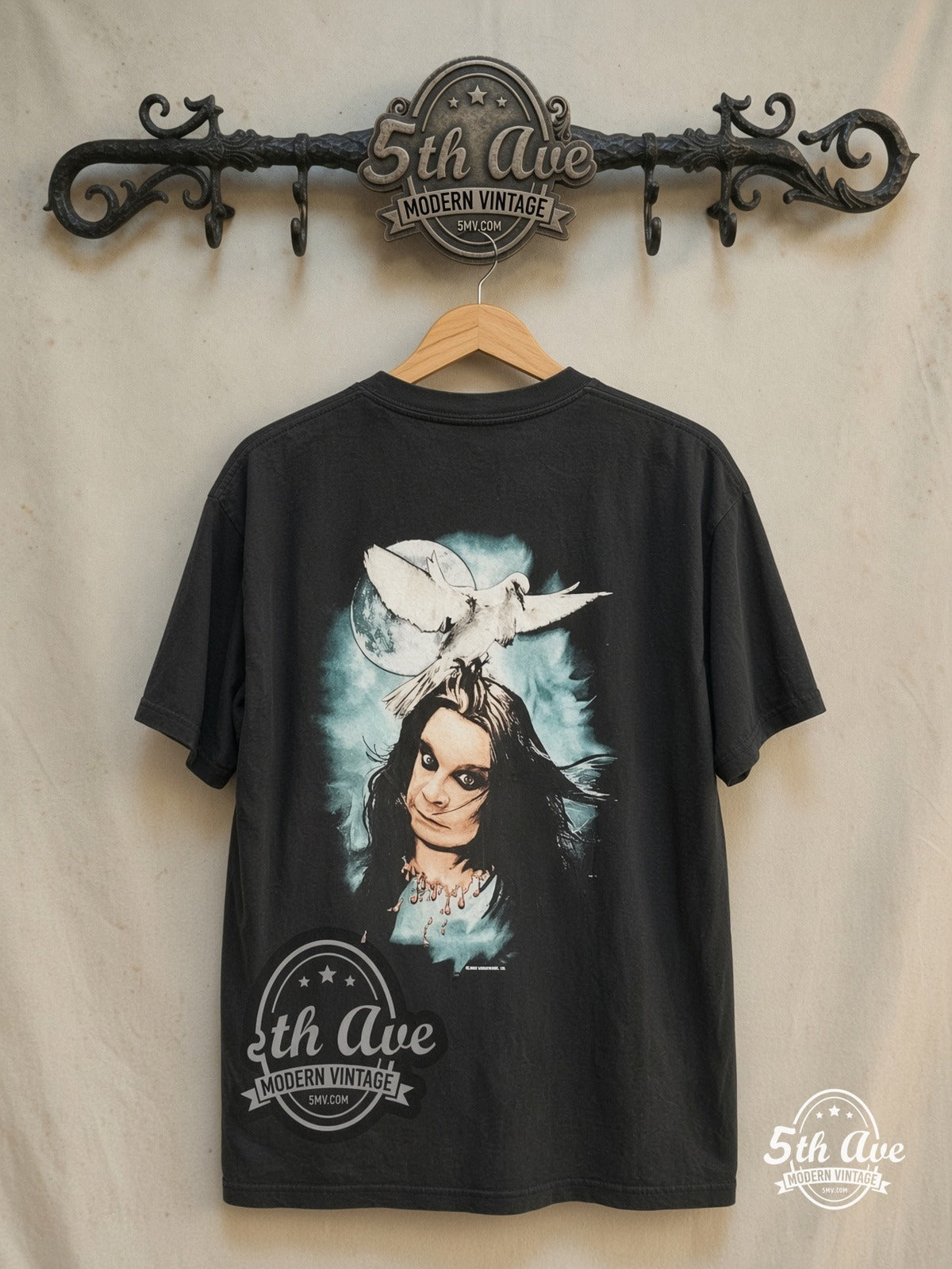 Ozzy Osbourne – Dove Holding Portrait Moon – Vintage Band T-Shirt — back on locked cream ornate 5th Ave rack