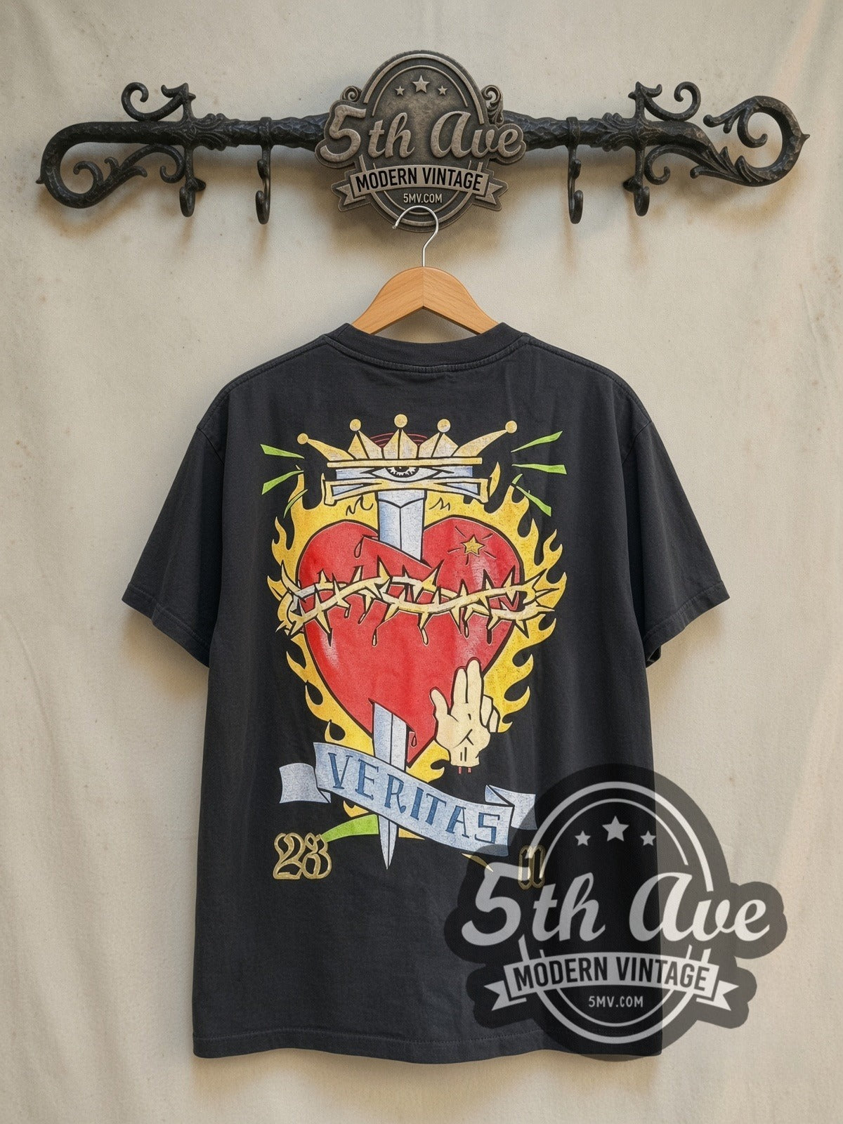 The Offspring Veritas vintage band t-shirt in black, back view on a display rack