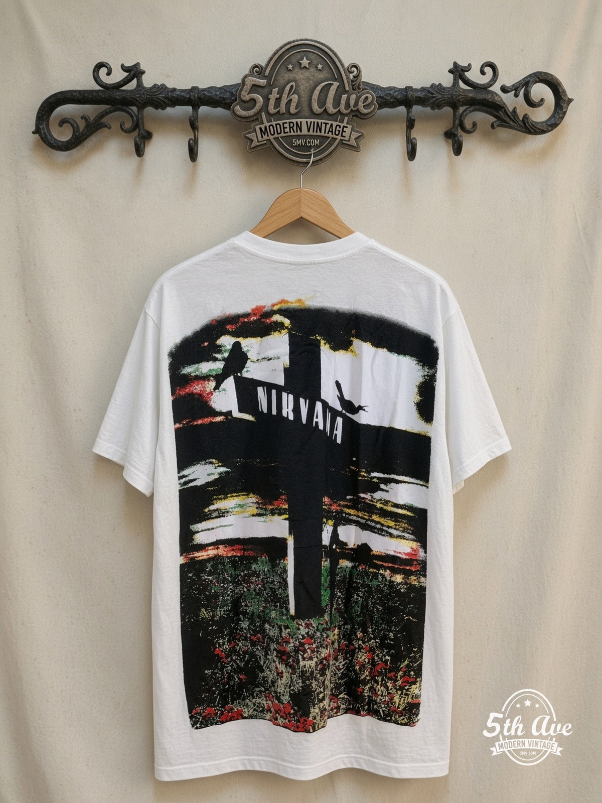 Nirvana – Who Killed Kurt Cobain? – All Over Print – Vintage Band T-Shirt — back on locked cream ornate 5th Ave rack