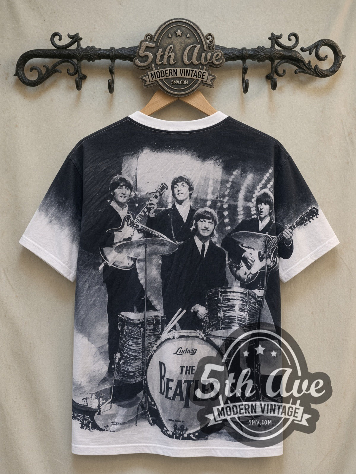 The Beatles Early Era Live Stage Photo vintage band t-shirt, back view on a display rack