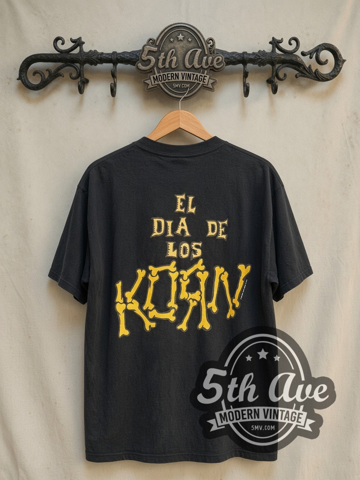 Korn EL DIA DE LOS vintage band t-shirt in black, back view on a display rack