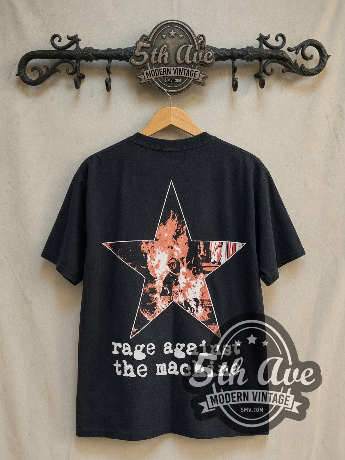 Rage Against the Machine Bombtrack vintage band t-shirt in black, back view on a display rack