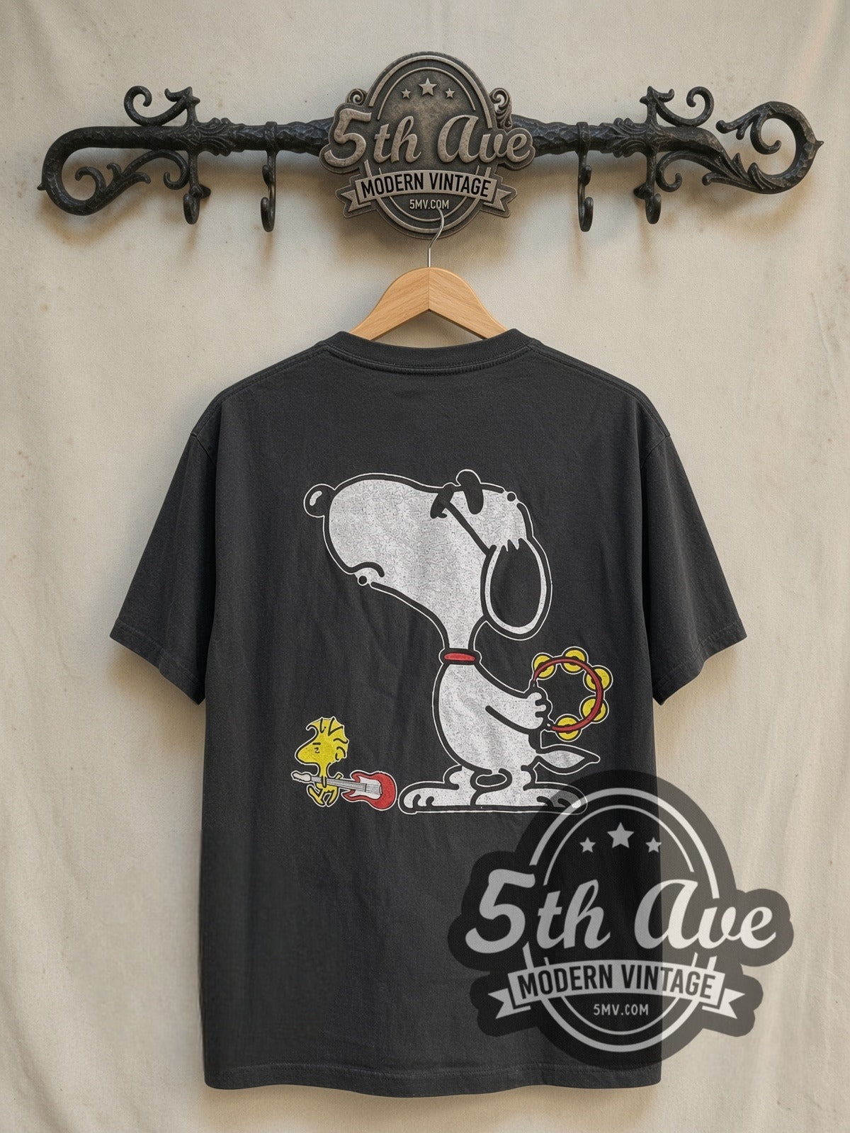 Oasis x Peanuts Snoopy graphic tee in black, back view on a display rack