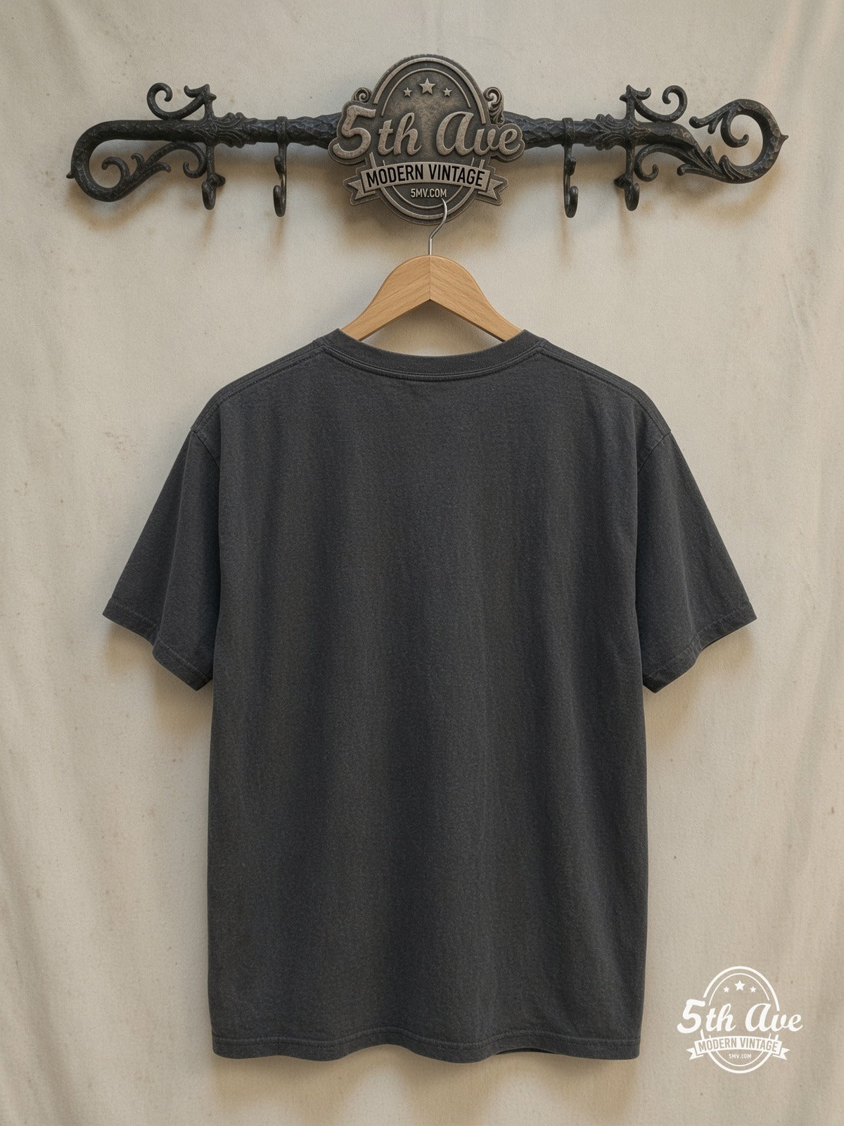 Led Zeppelin – Whole Lotta Love – Vintage Band T-Shirt — back on locked cream ornate 5th Ave rack