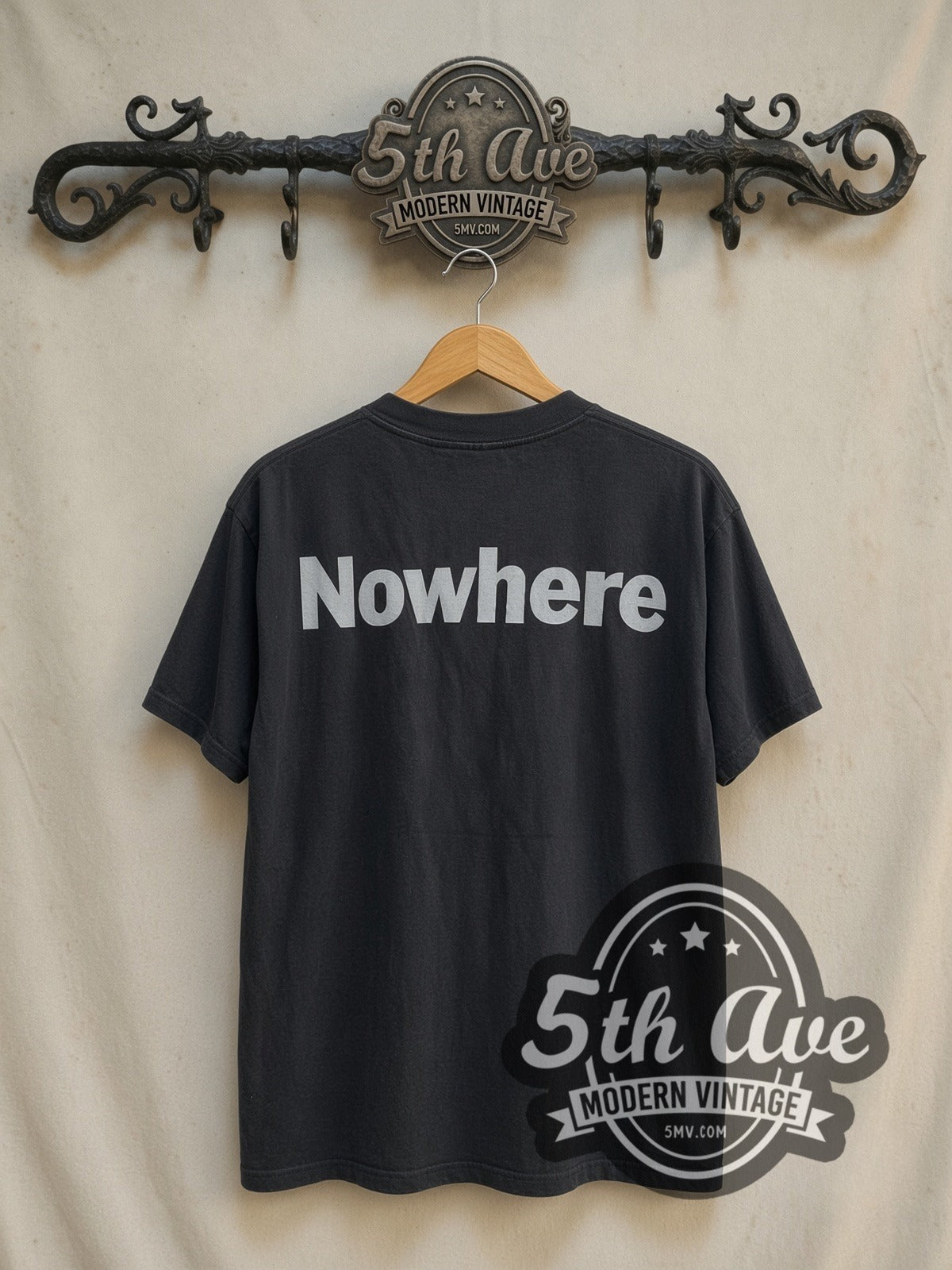 Ride Nowhere vintage band t-shirt in black, back view on a display rack