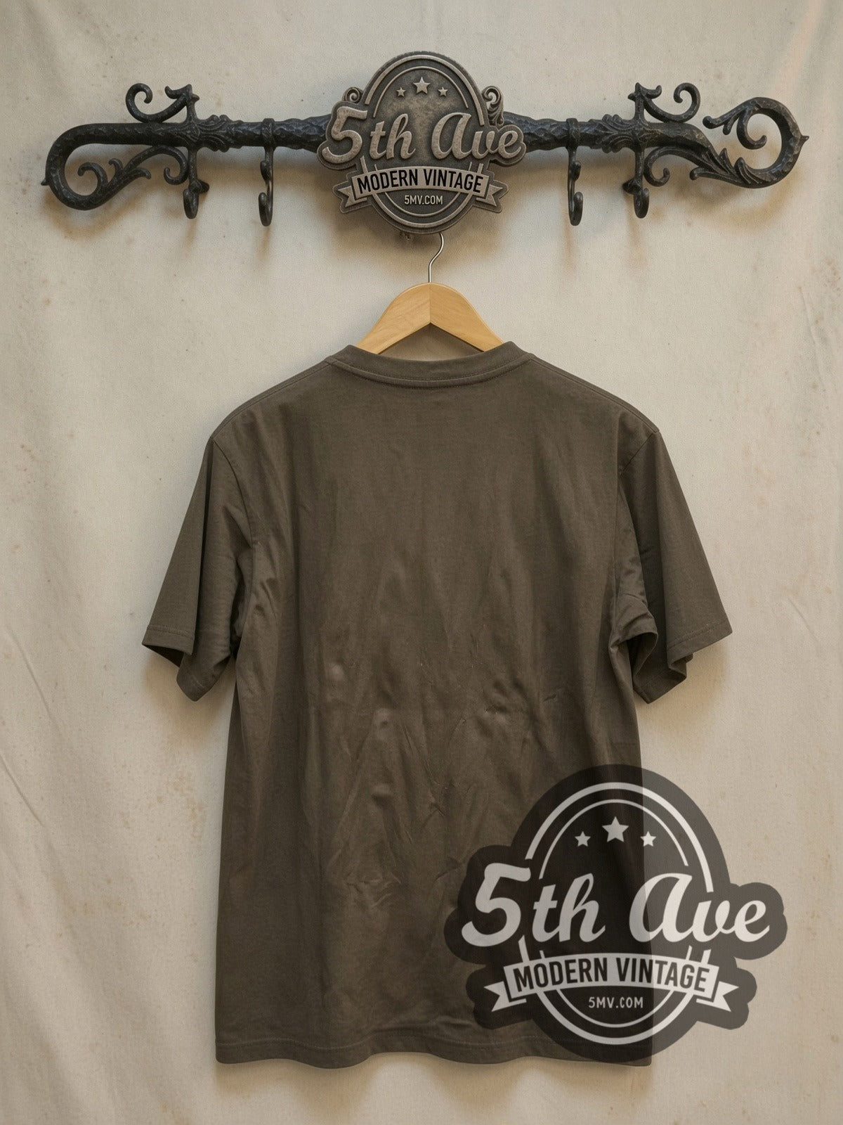 Creedence Clearwater Revival Cosmo's Factory vintage band t-shirt, back view on a display rack