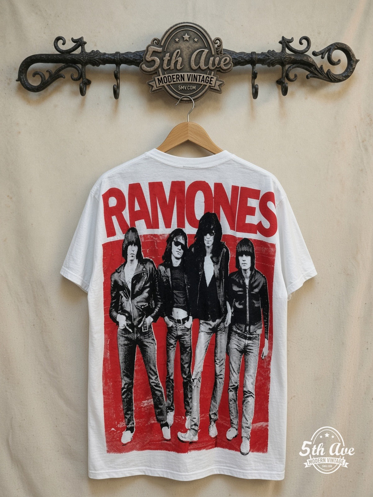 The Ramones – The Ramones – All Over Print – Vintage Band T-Shirt — back on locked cream ornate 5th Ave rack