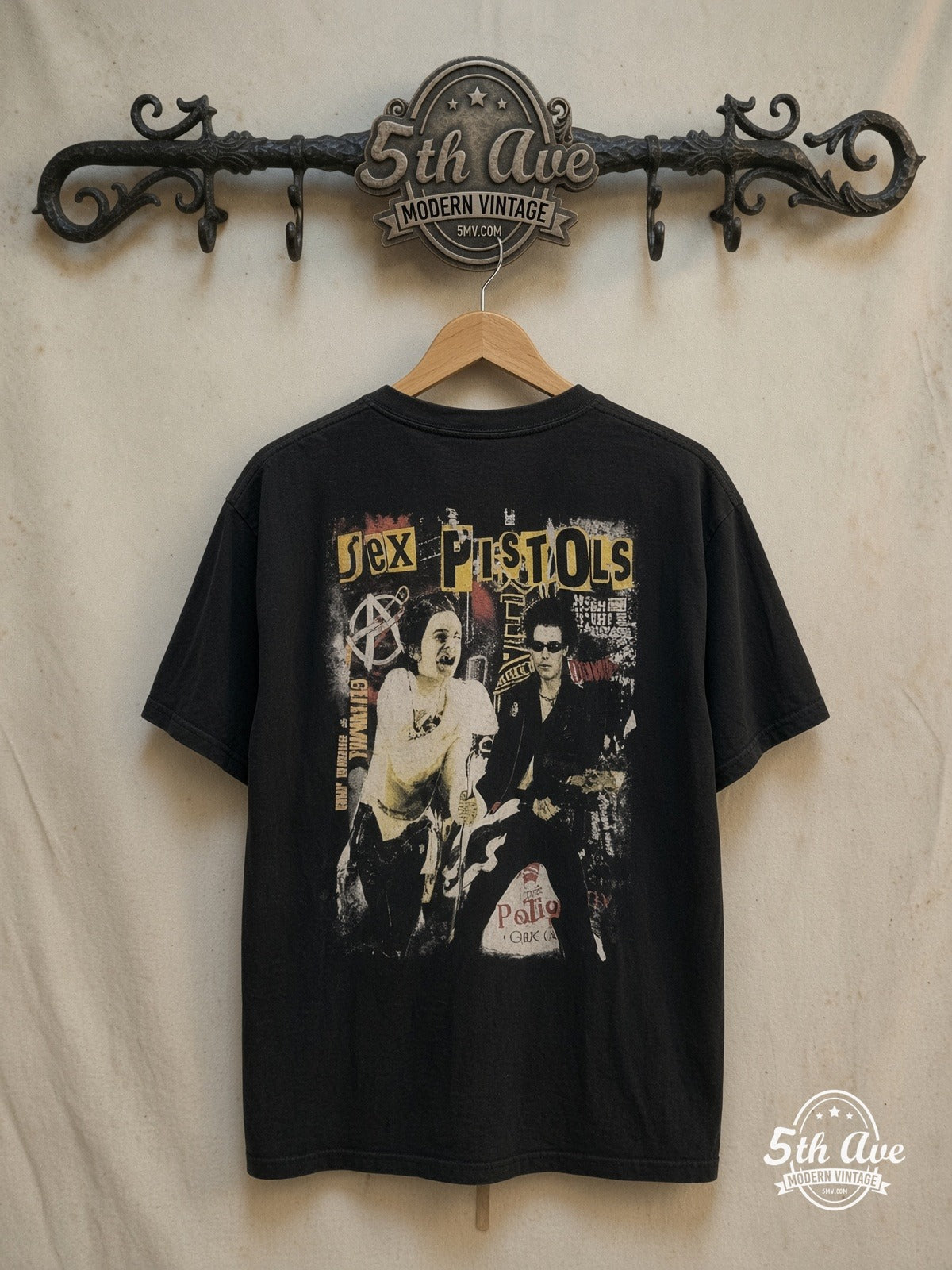 Sex Pistols Sid Vicious Distressed T-Shirt — back on locked cream ornate 5th Ave rack