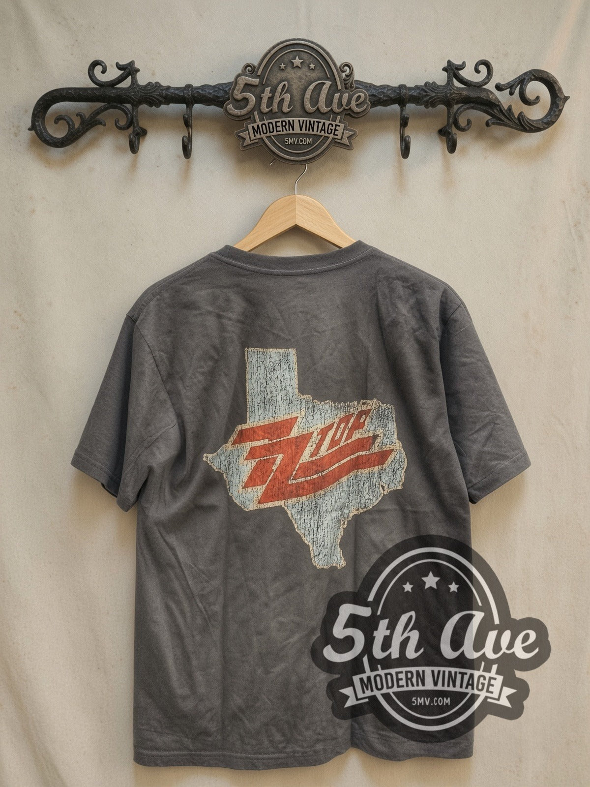 Graphic ZZ Top vintage band t-shirt, back view on a display rack