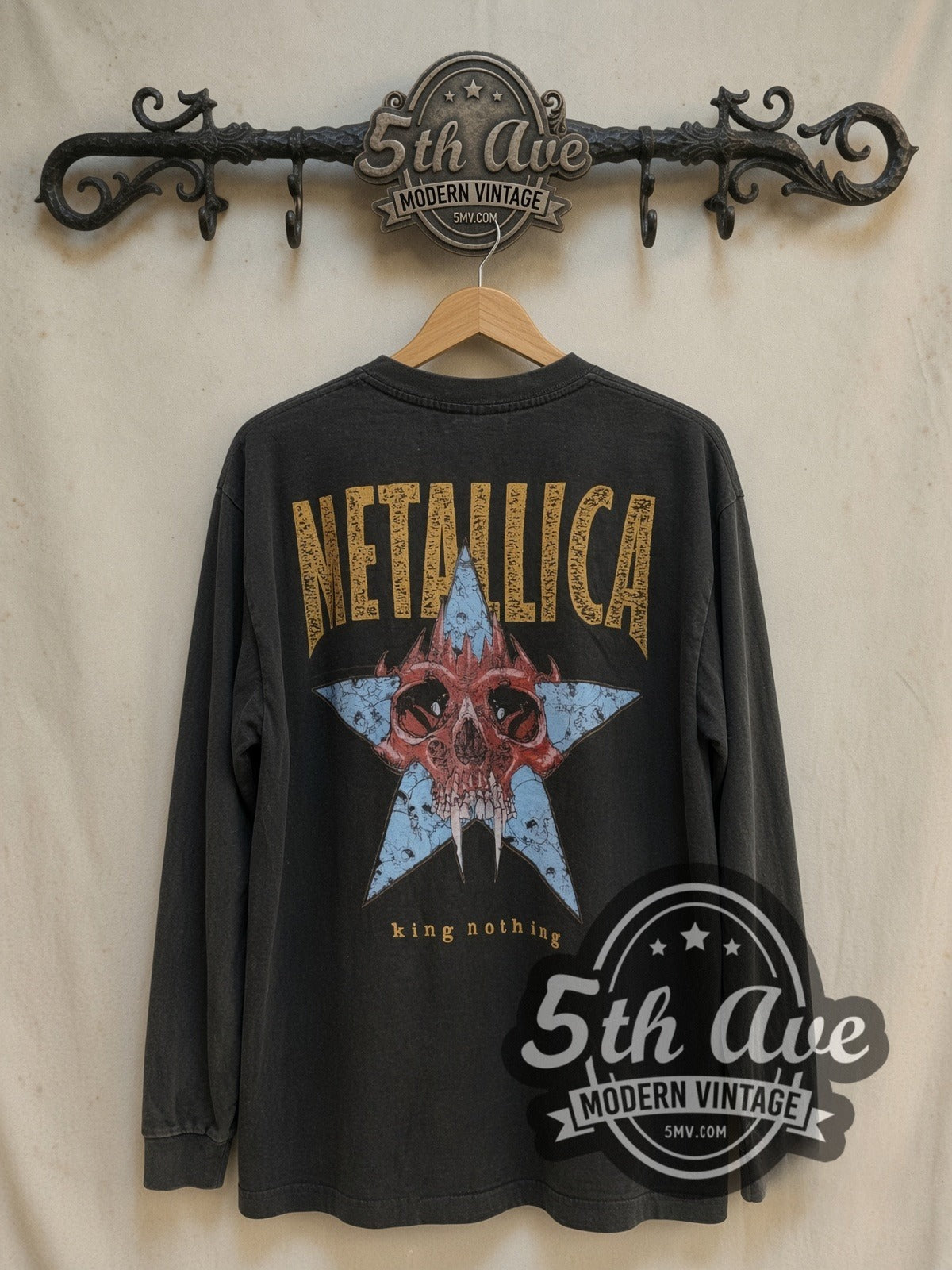 Metallica King Nothing Careful What You Wish long sleeve vintage band t-shirt, back view on a display rack