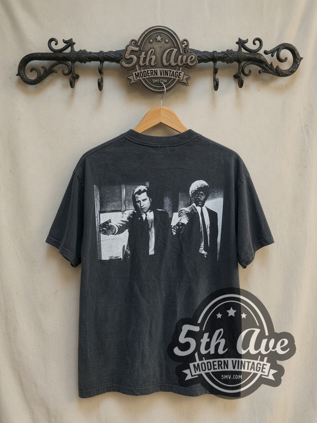 Pulp Fiction vintage graphic t-shirt, back view on a display rack