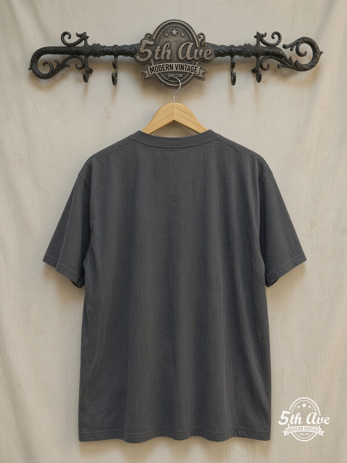 Iron Maiden – Chained Eddie RIP Tombstone – Vintage Band T-Shirt — back on locked cream ornate 5th Ave rack