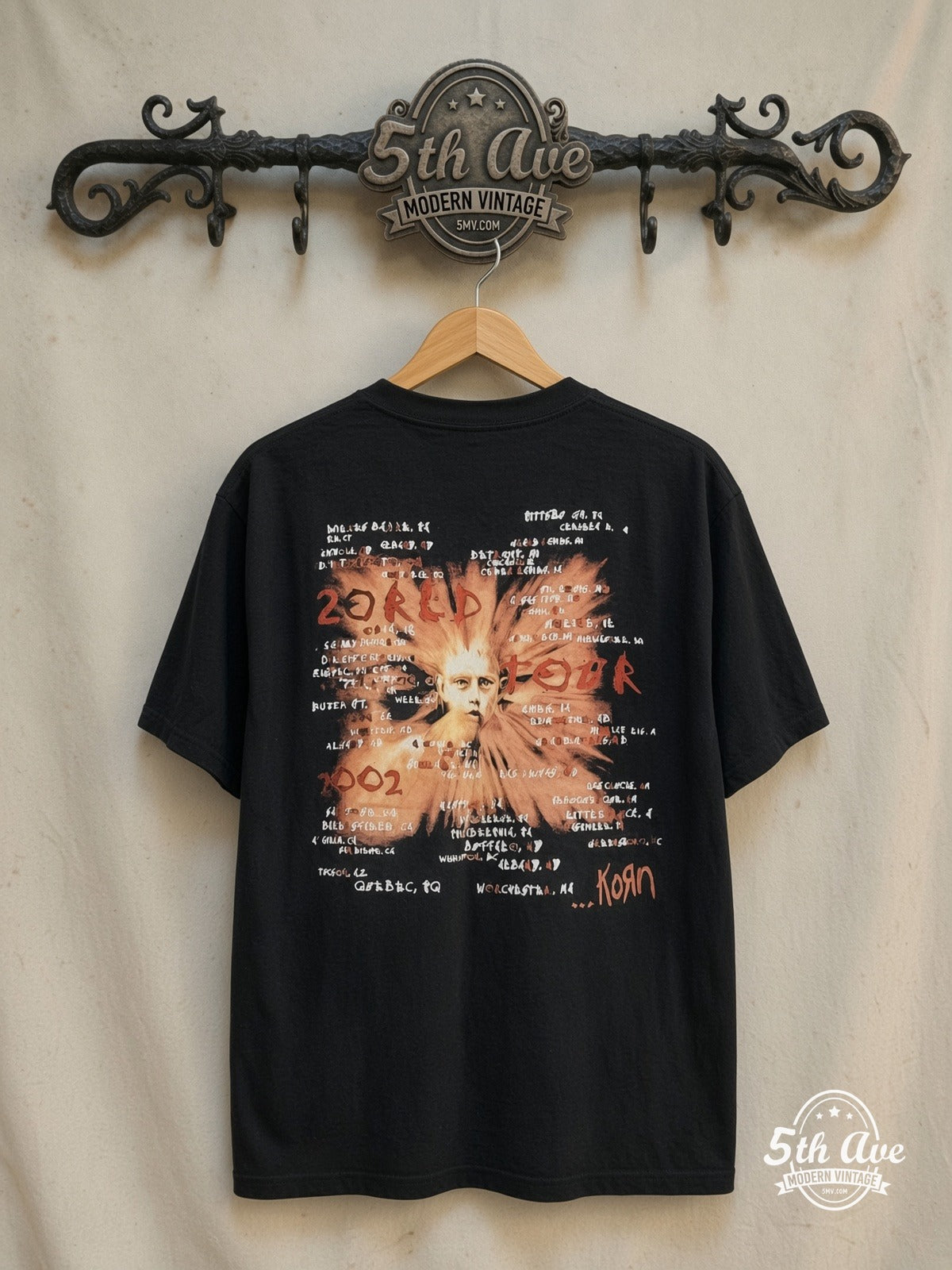 Korn – World Tour' 2002 – Vintage Band T-Shirt — back on locked cream ornate 5th Ave rack