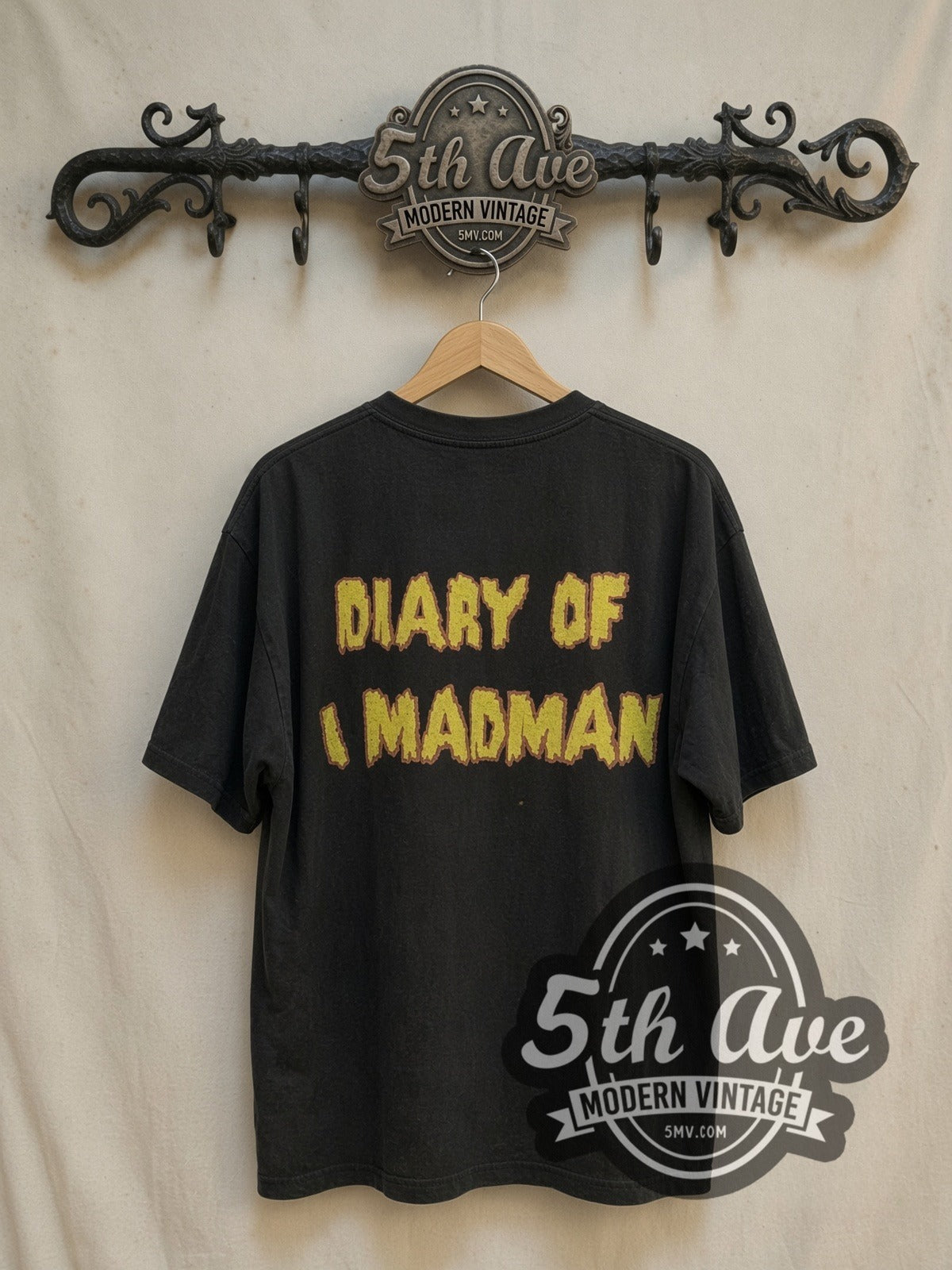 Ozzy Osbourne Diary of a Madman vintage band t-shirt, back view on a display rack