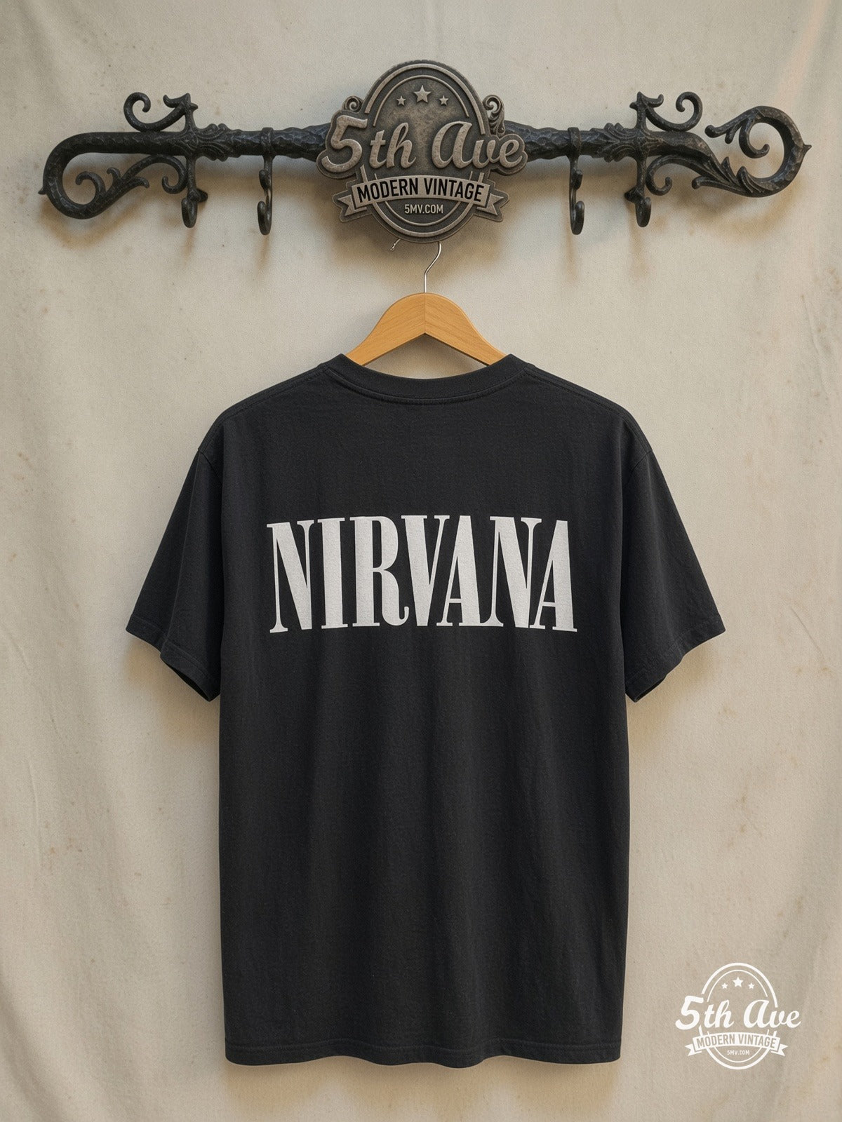 Nirvana – 1967–1994 – Vintage Band T-Shirt — back on locked cream ornate 5th Ave rack