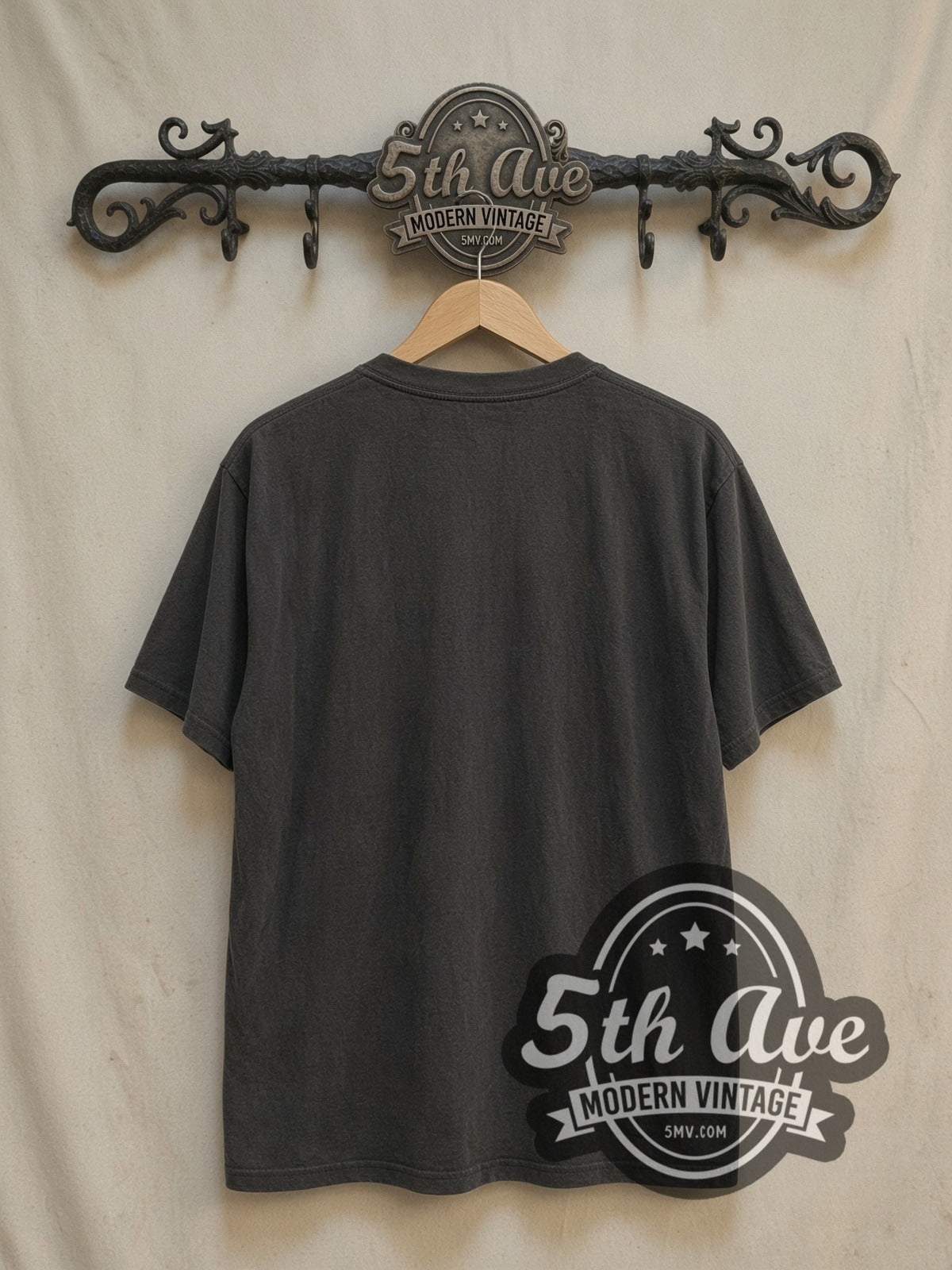 David Bowie Blue 70s Hat Portrait vintage band t-shirt, back view on a display rack