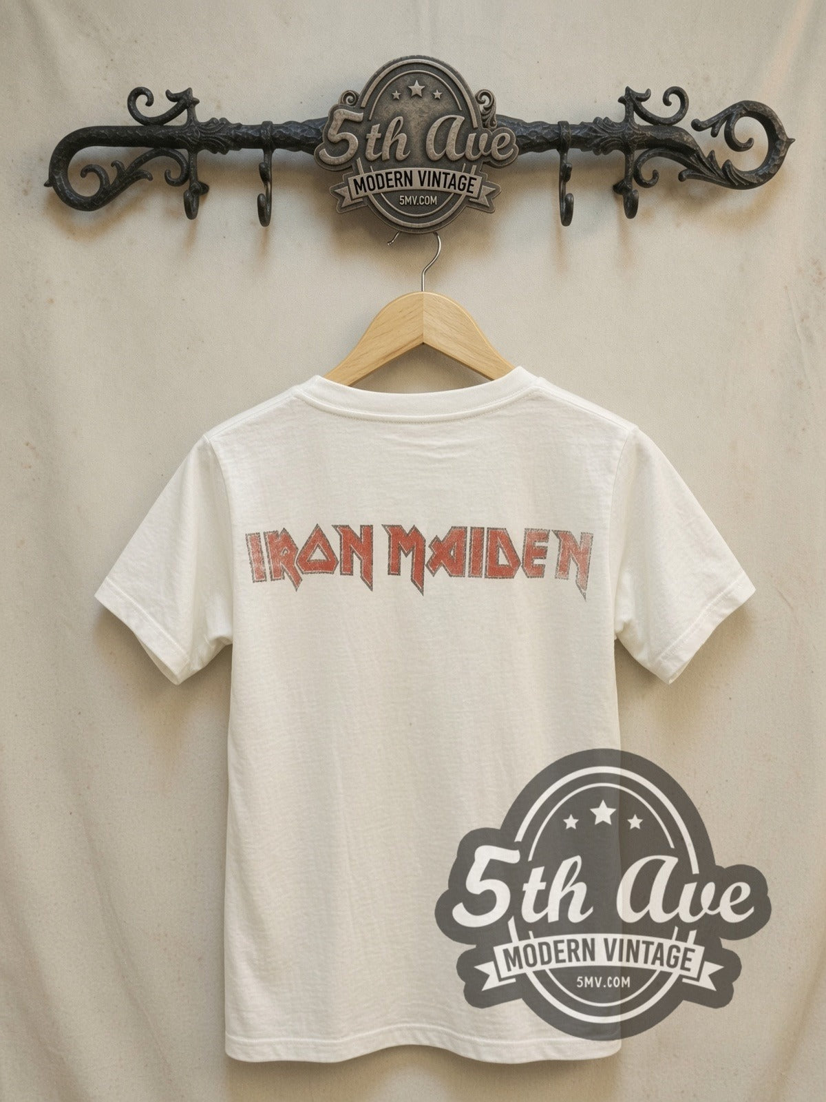 Iron Maiden Union Jack Band Photo vintage band t-shirt, back view on a display rack