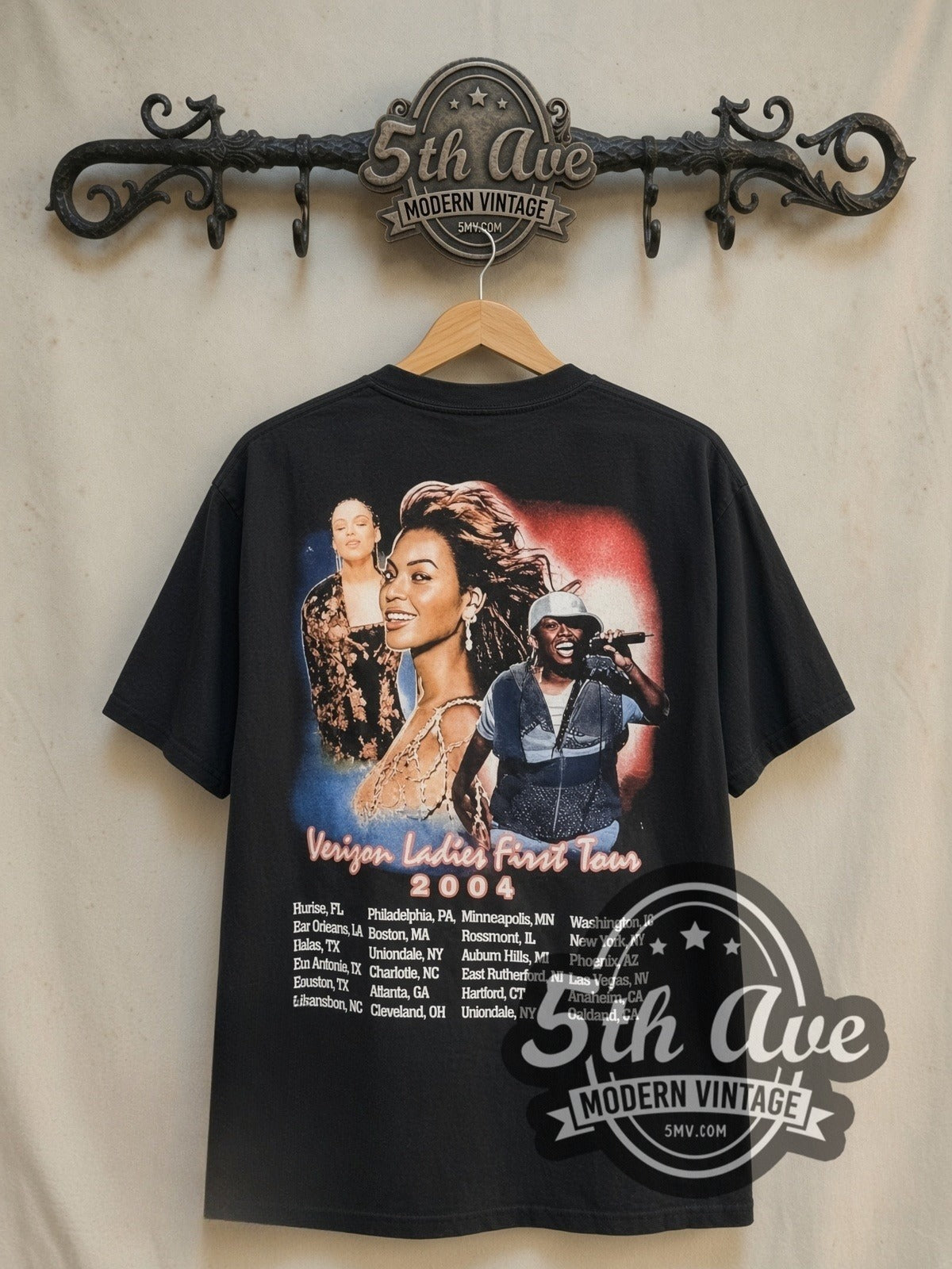 Beyoncé, Alicia Keys and Missy Elliott Verizon Ladies First Tour vintage band t-shirt in black, back view on a display rack