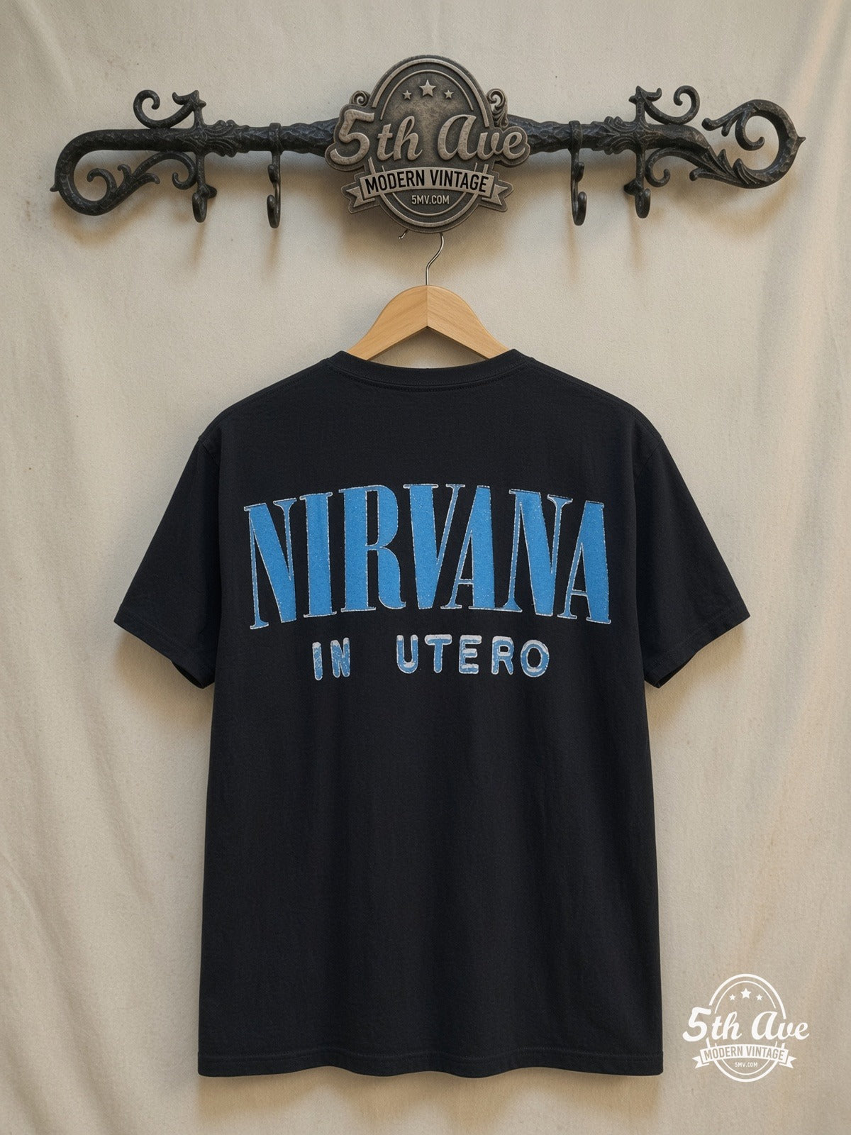Nirvana – In Utero Blue Logo Anatomical Angel – Vintage Band T-Shirt — back on locked cream ornate 5th Ave rack