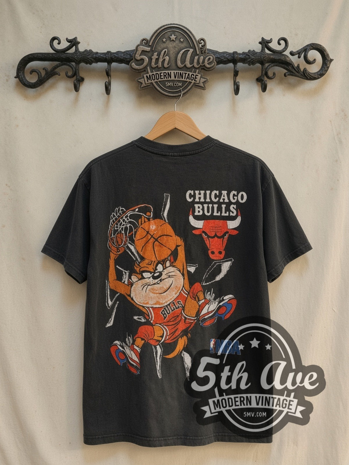 Looney Tunes Taz-Mania x Chicago Bulls vintage cartoon tee in black, back view on a display rack