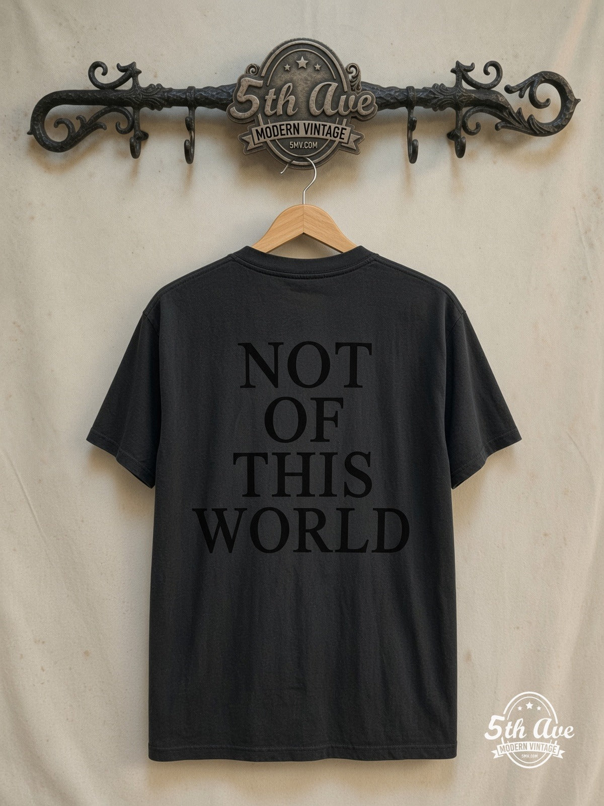Dennis Rodman – Not of This World – Vintage Graphic Tee — back on locked cream ornate 5th Ave rack