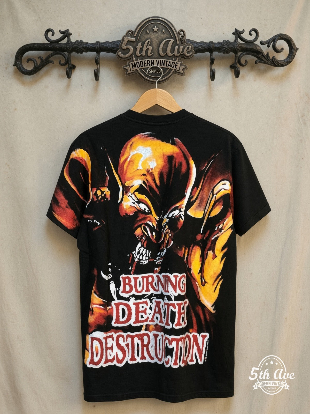 Manowar – Hell on Stage All Over Print T-Shirt – Vintage Band T-Shirt — back on locked cream ornate 5th Ave rack