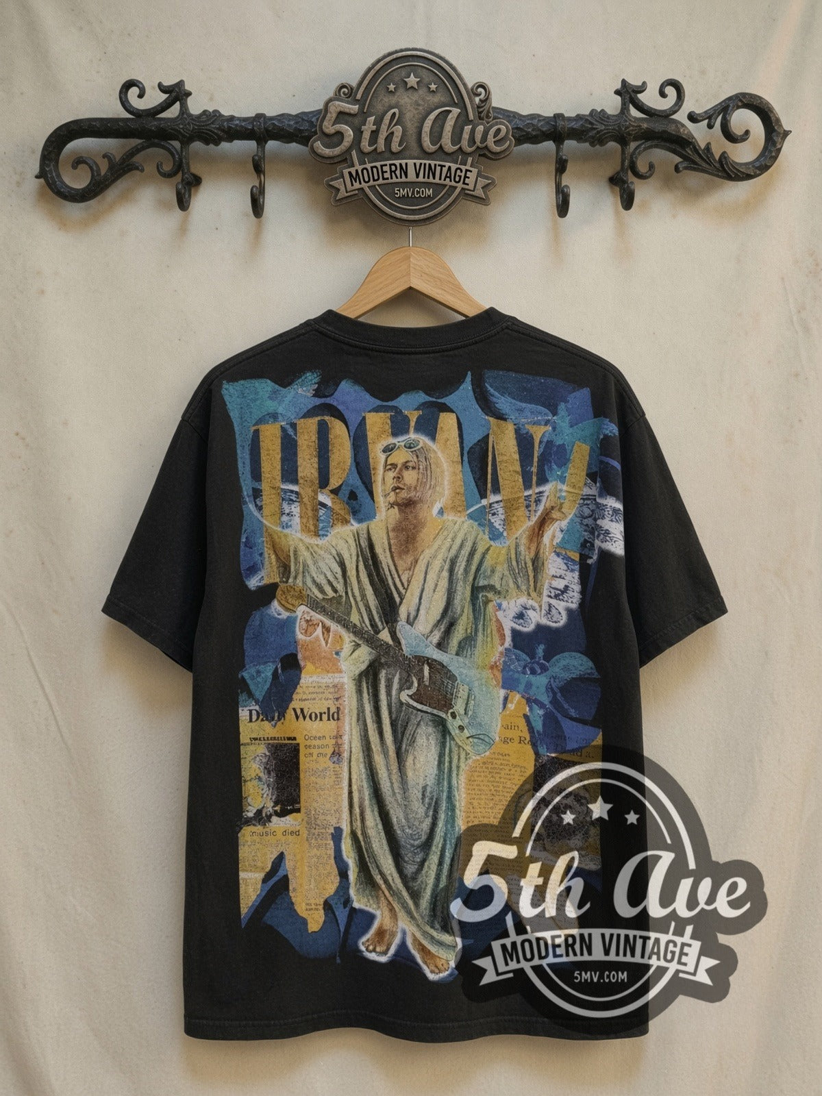 Nirvana Kurt Cobain Overprint vintage band t-shirt, back view on a display rack