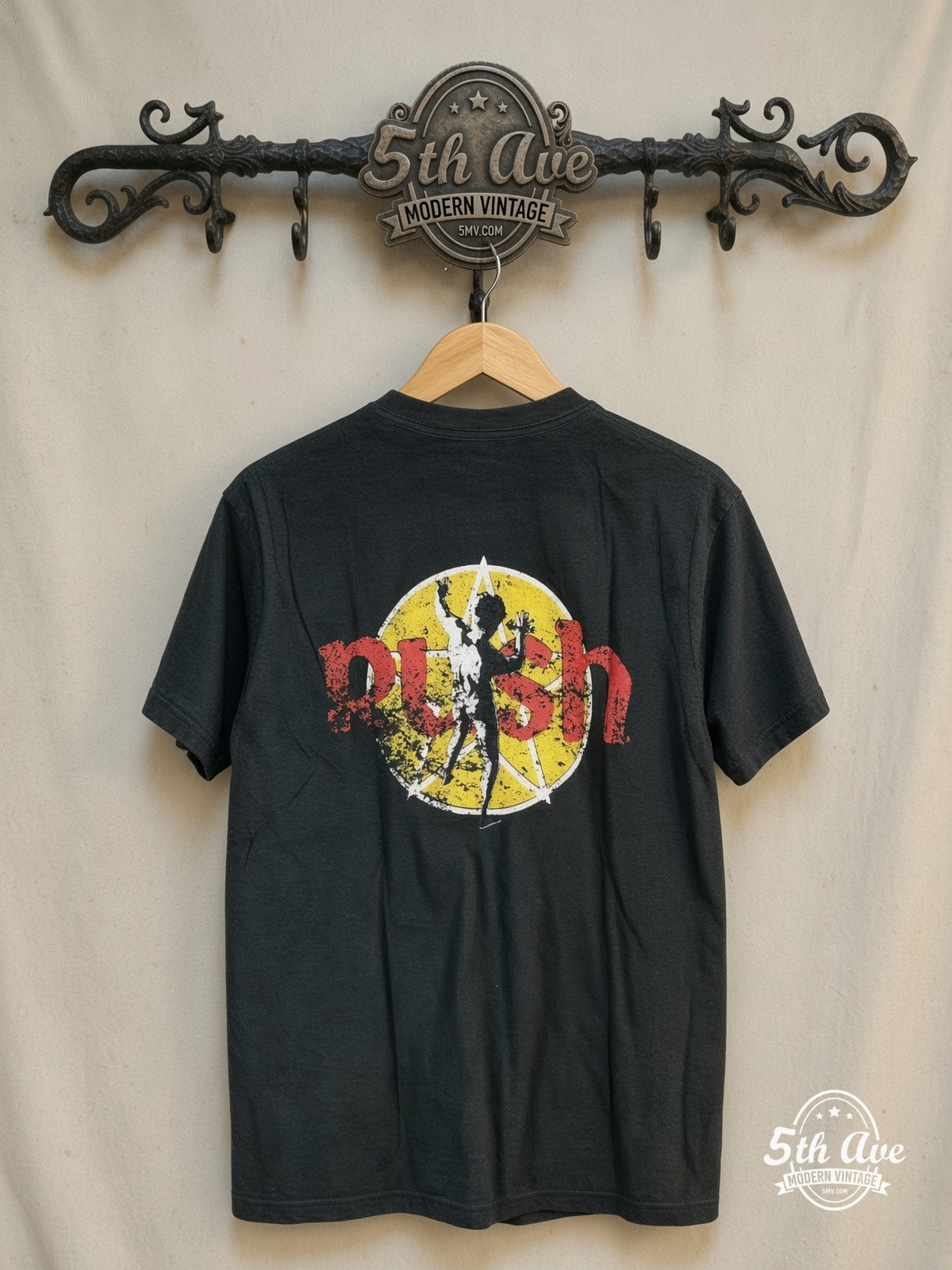 Rush – Starman – Vintage Band T-Shirt — back on locked cream ornate 5th Ave rack