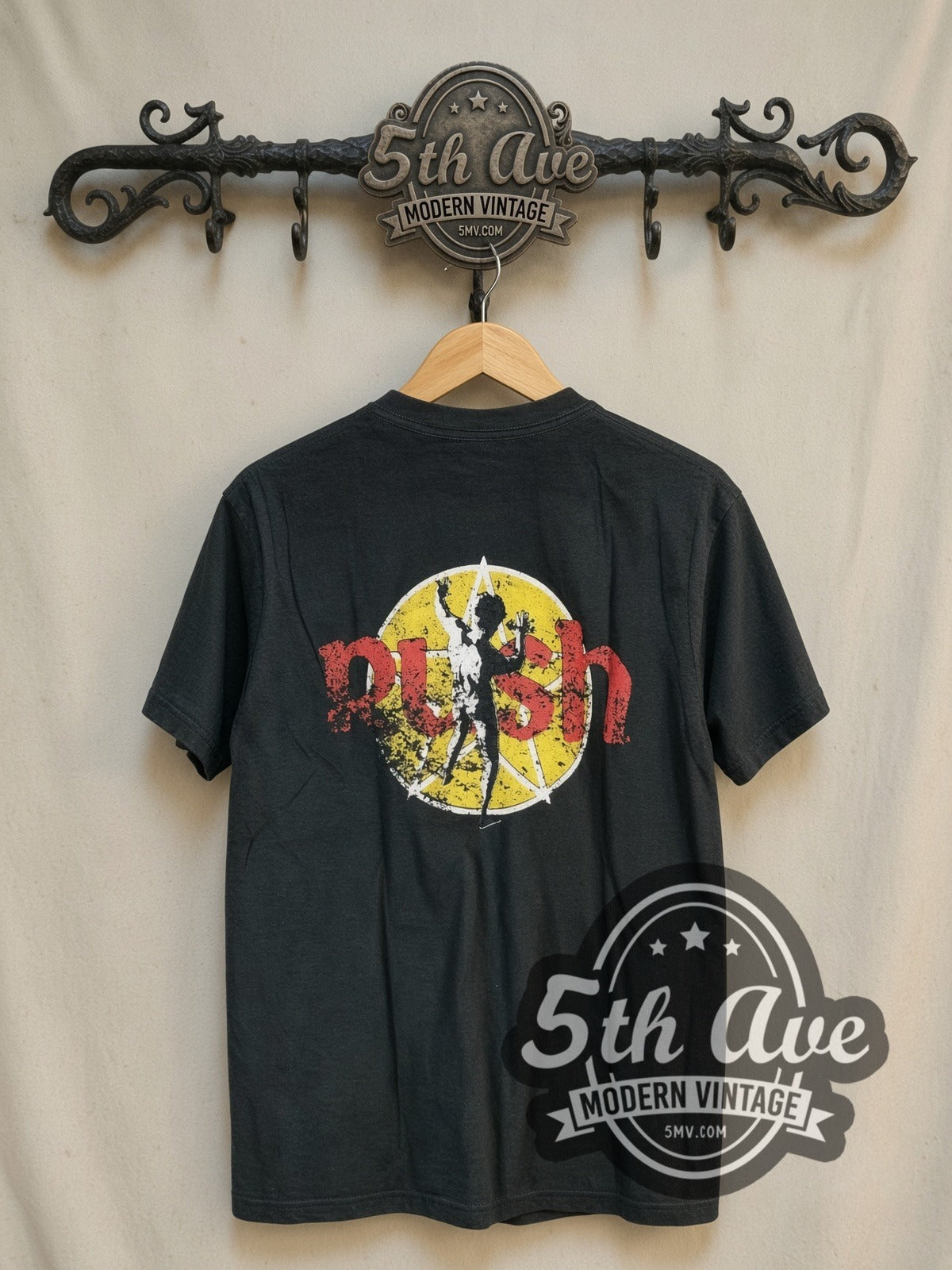 Rush Starman vintage band t-shirt, back view on a display rack