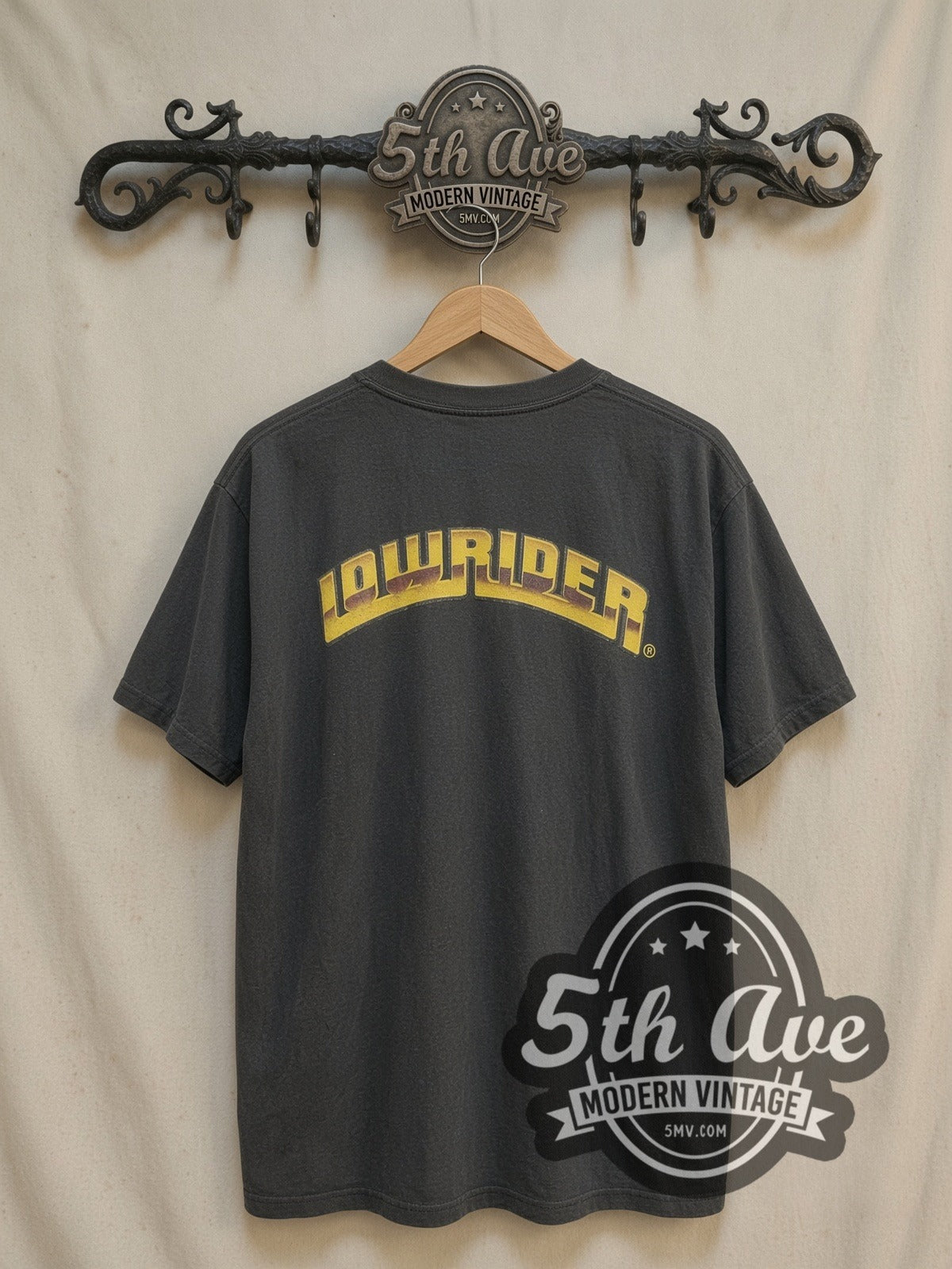 Rollin Hard The Arizona Super Show vintage graphic tee, back view on a display rack