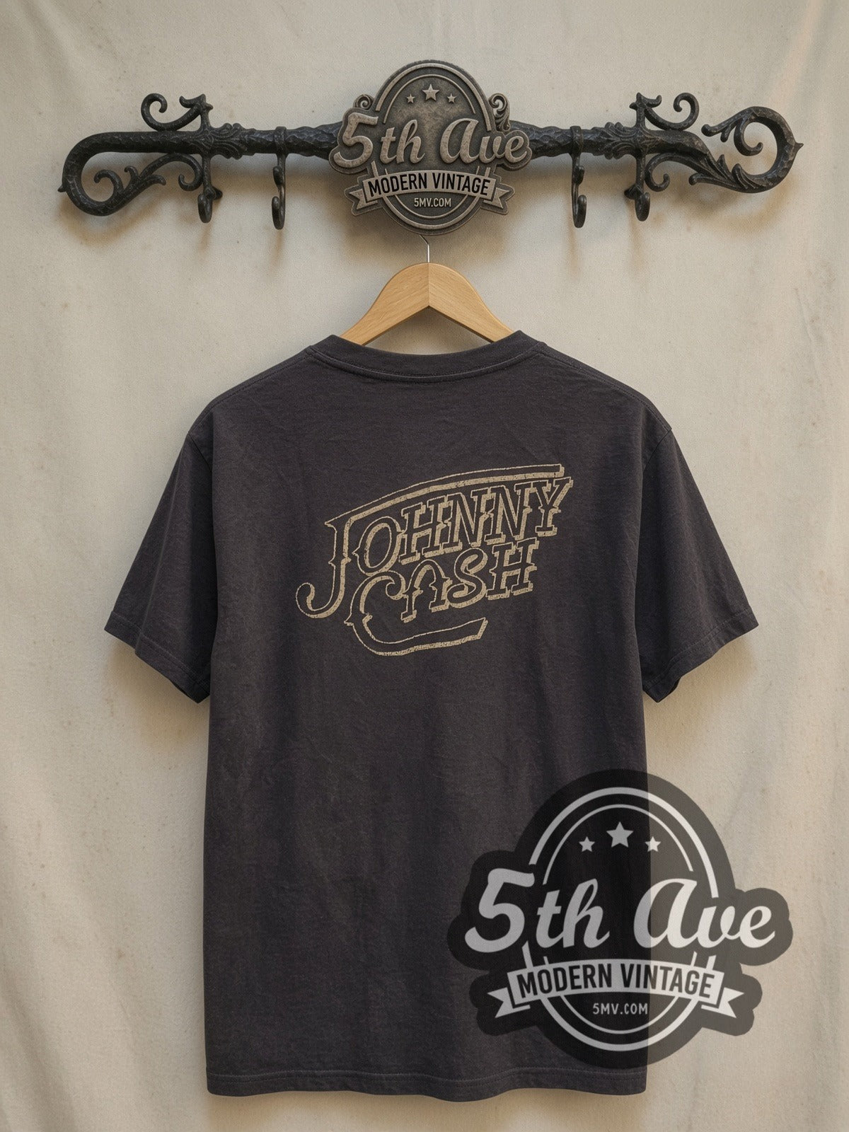 Johnny Cash Circle Portrait vintage band t-shirt, back view on a display rack