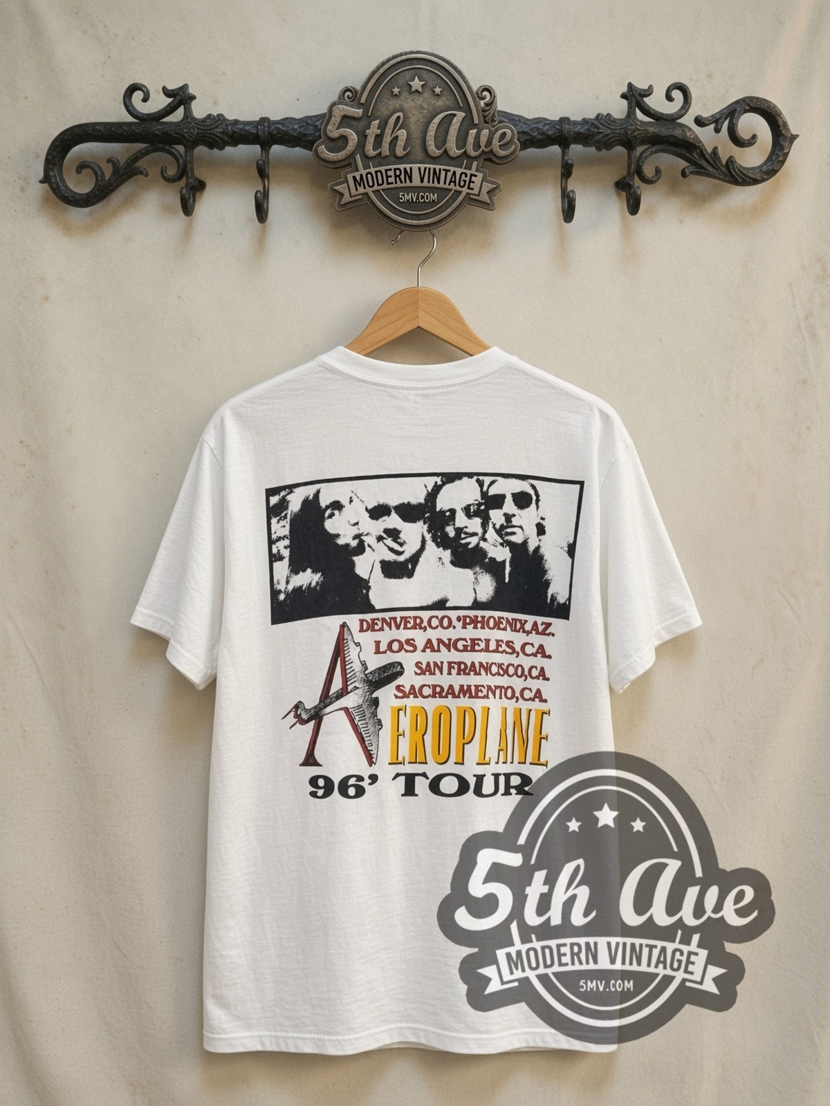 Red Hot Chili Peppers Aeroplane Tour' 1996 vintage band t-shirt in white, back view on a display rack