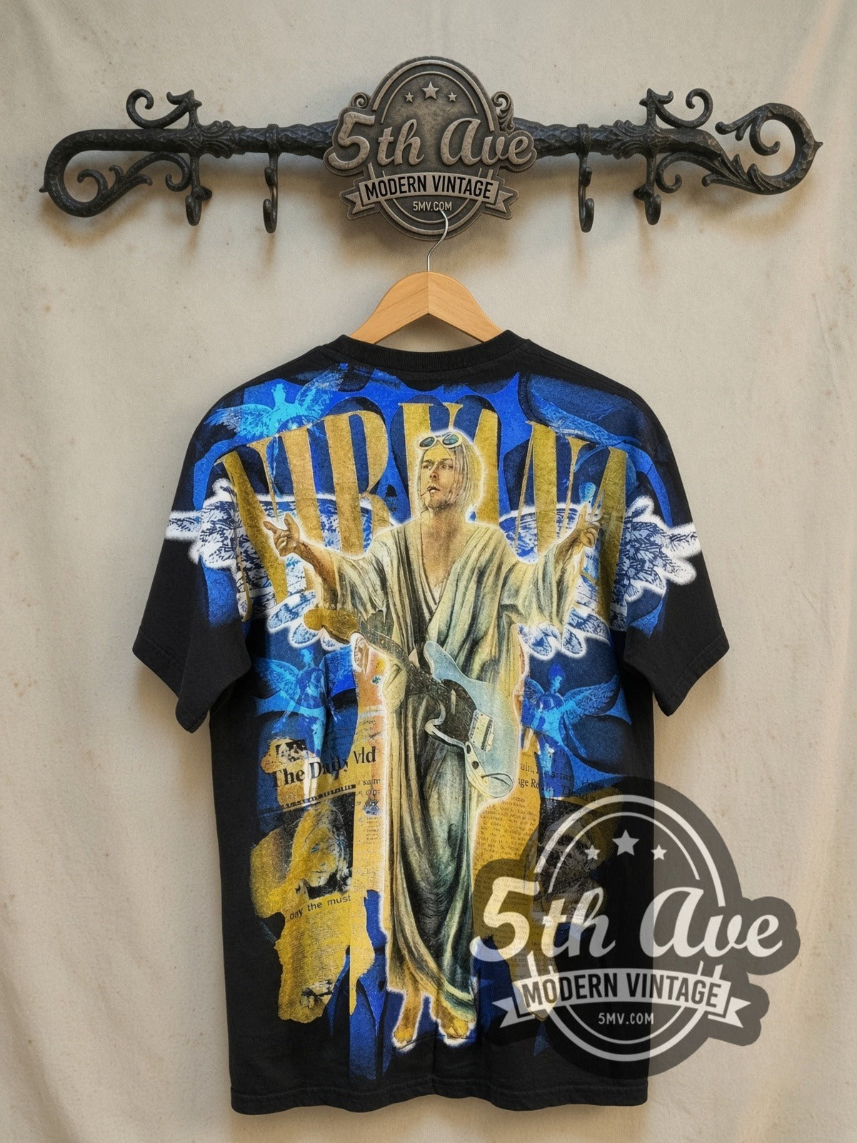 Kurt Cobain Nirvana in The Daily World all-over-print vintage band t-shirt, back view on the 5MV rack