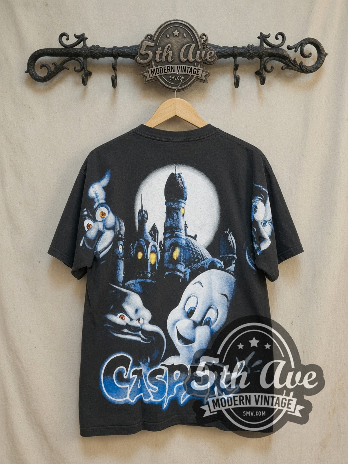 Casper all-over-print vintage graphic t-shirt, back view on a display rack