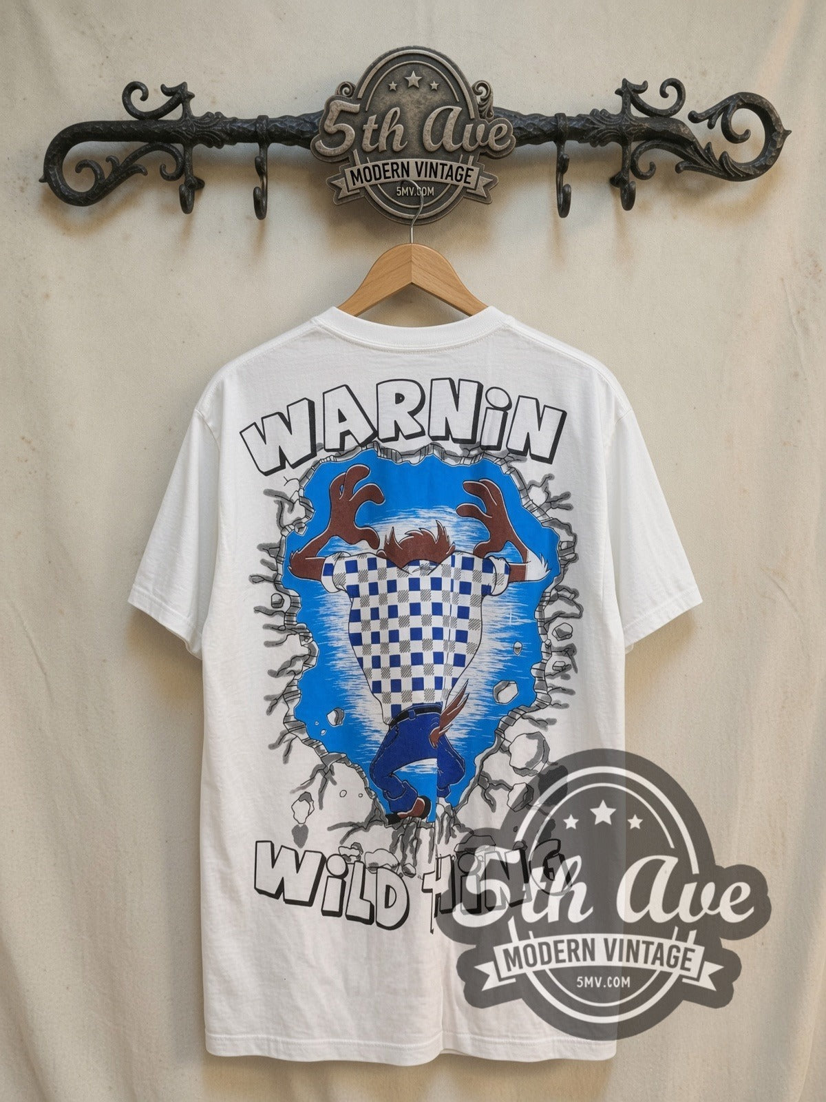 Looney Tunes Taz-Mania Warning Wild Thing vintage cartoon tee, back view on a display rack
