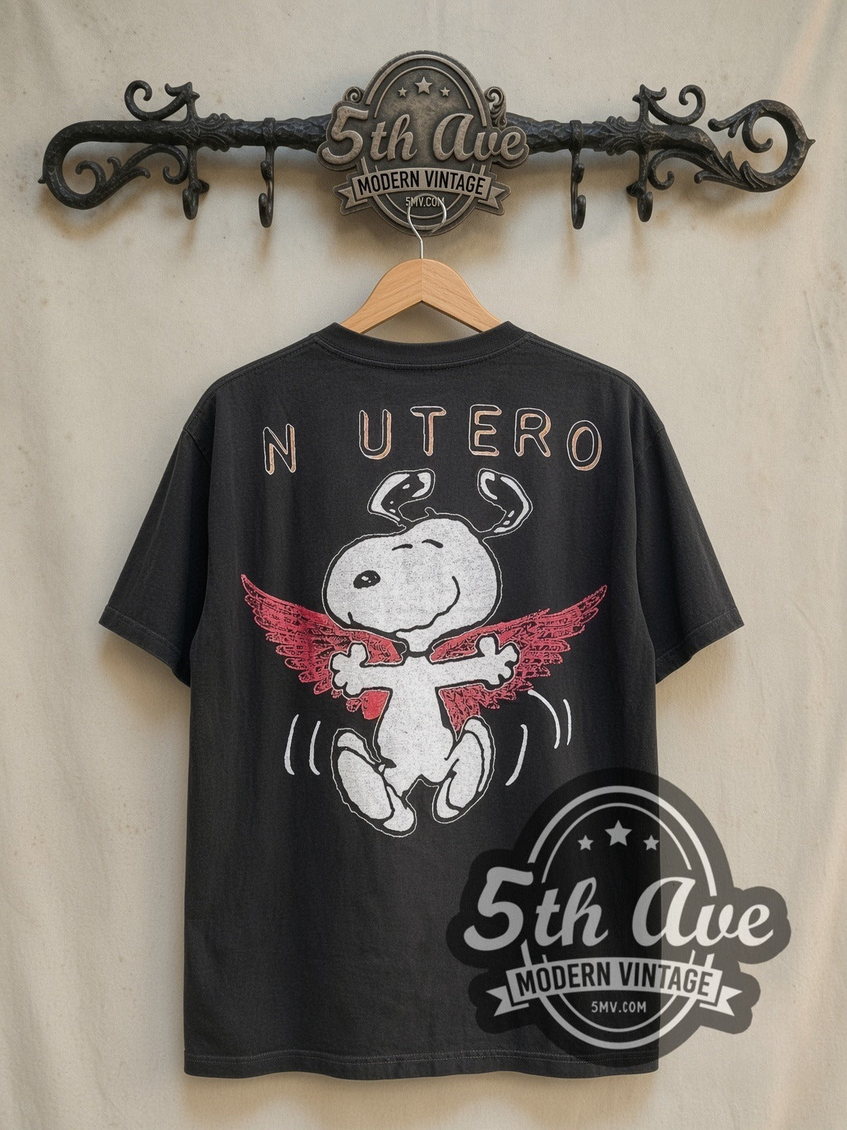 Peanuts Nirvana In Utero x Snoopy vintage cartoon tee in black, back view on a display rack