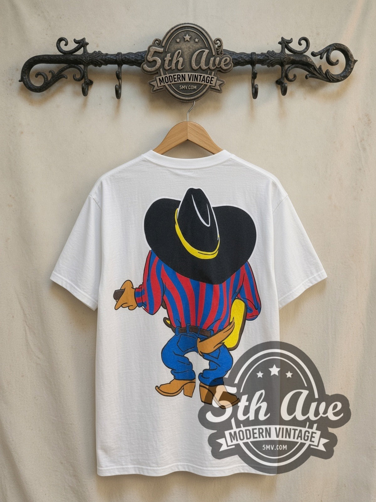 Looney Tunes Garth Brooks Taz-Mania vintage cartoon tee, back view on a display rack