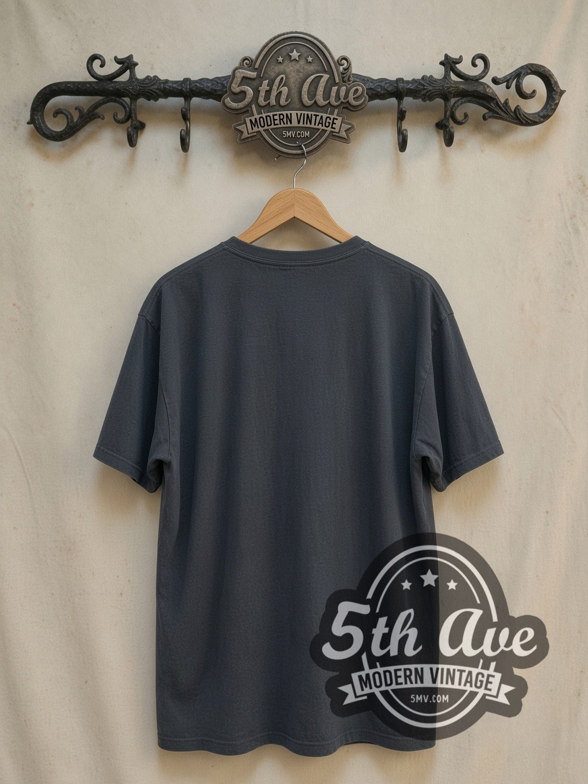 The Goonies Truffle Shuffle vintage movie t-shirt, back view on a display rack