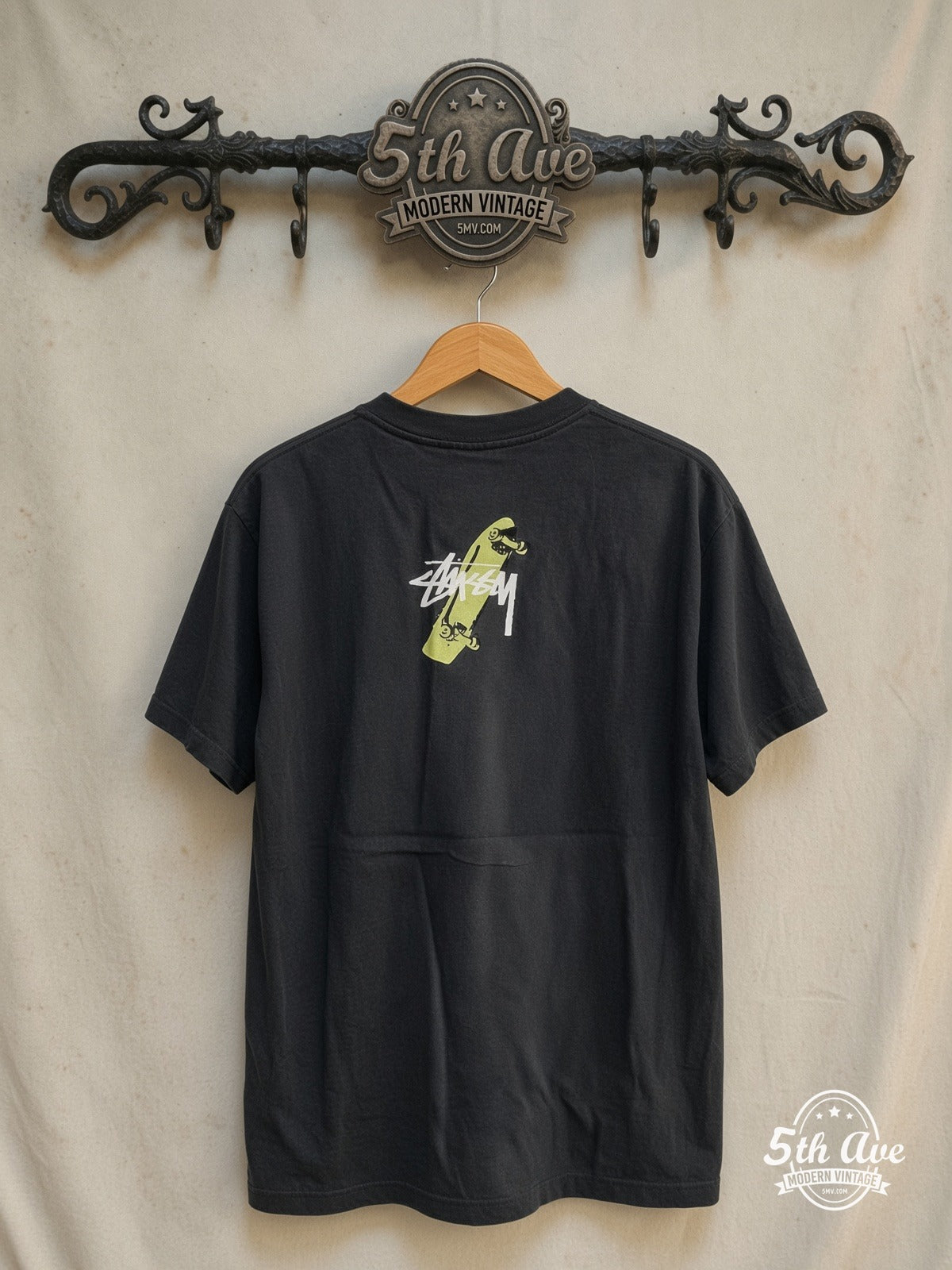 Stussy – Tokyo Homeboy Toyoda – Vintage Graphic Tee — back on locked cream ornate 5th Ave rack