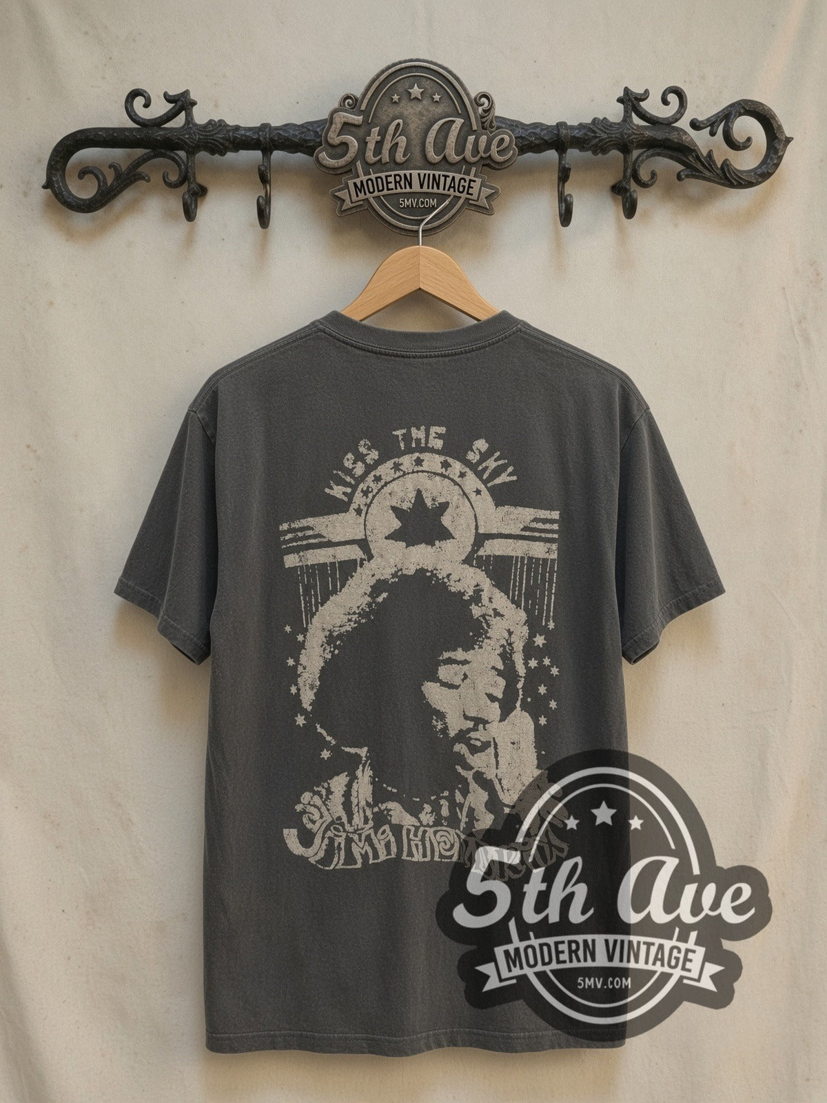 Jimi Hendrix Hat Guitar Portrait Vertical Name vintage band t-shirt, back view on a display rack