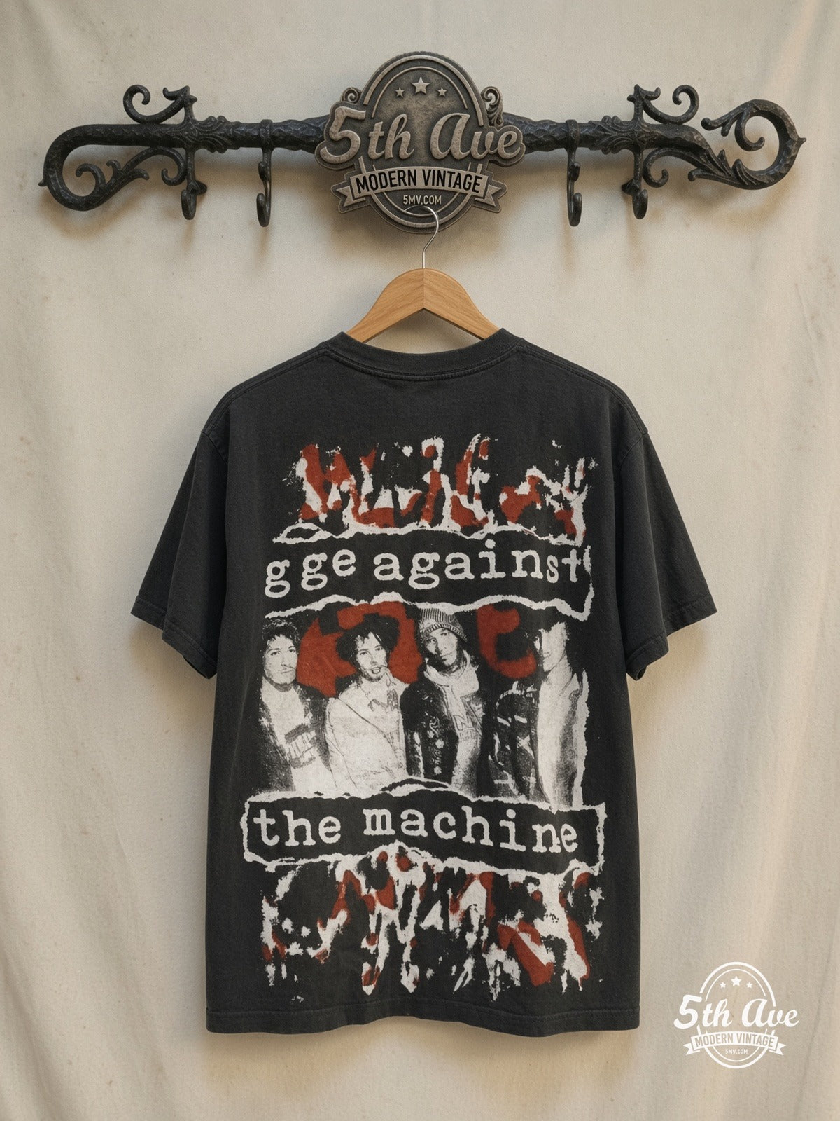 Rage Against the Machine – Bombtrack – All Over Print – Vintage Band T-Shirt — back on locked cream ornate 5th Ave rack