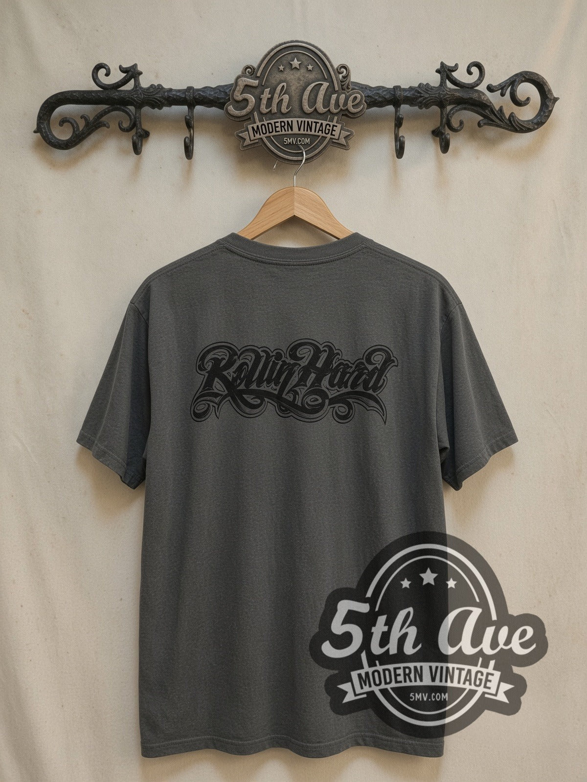 Rollin Hard Heartbreaker Lowrider vintage graphic tee, back view on a display rack