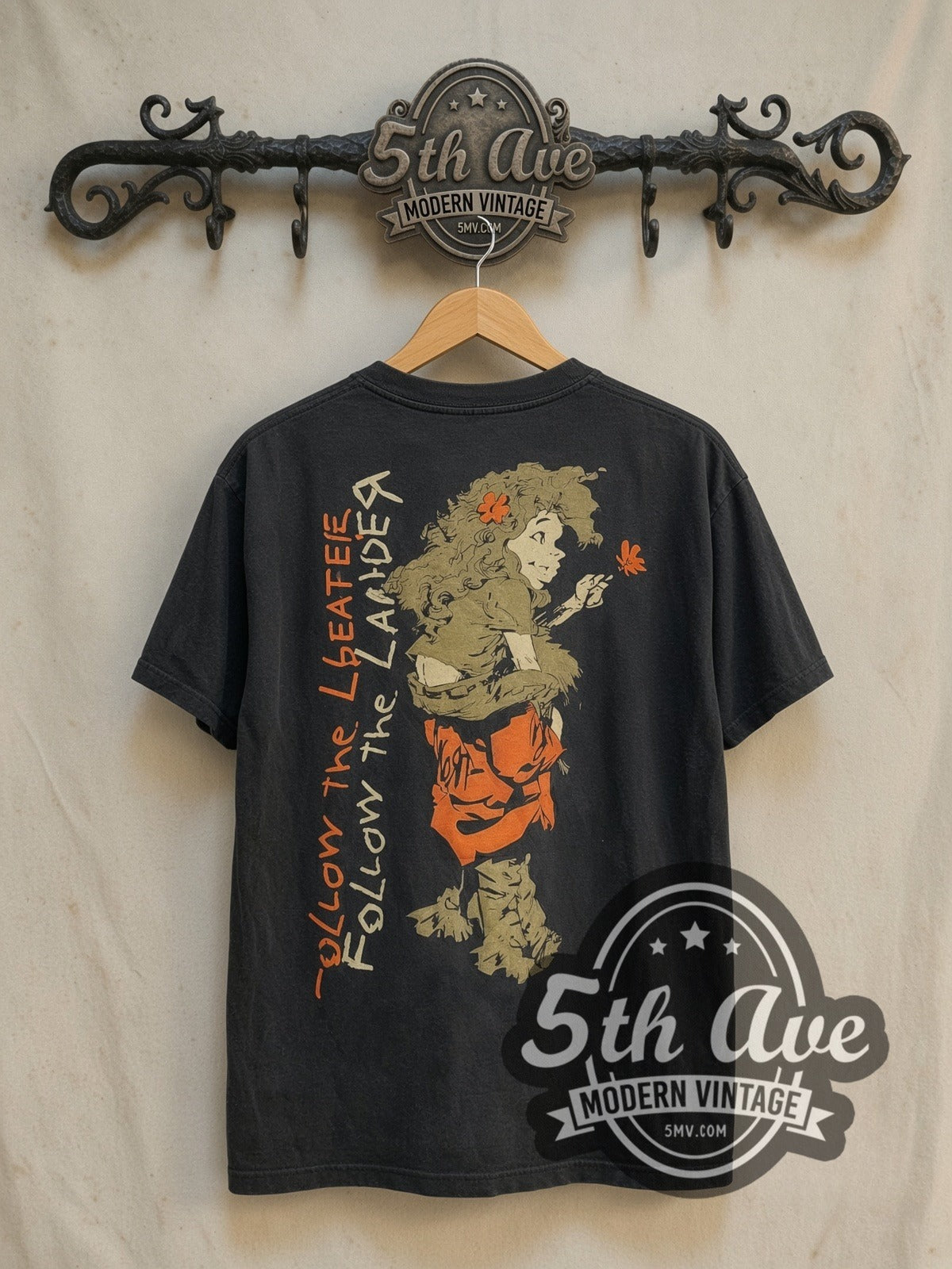 Korn Follow the Leader vintage band t-shirt in black, back view on a display rack
